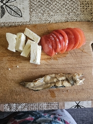 Fish, cheese and tomato