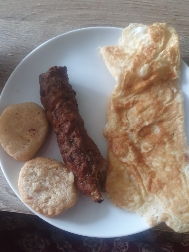 Kebab with egg and biscuits