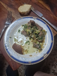 Beef with greens and bread