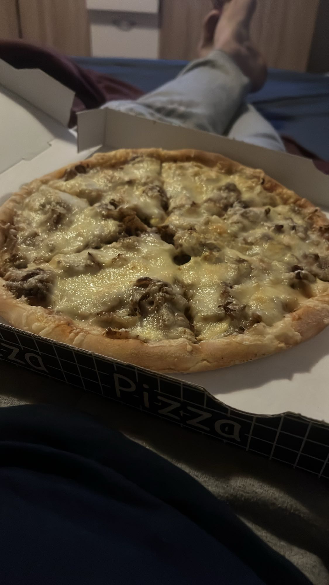Pizza de carne y queso