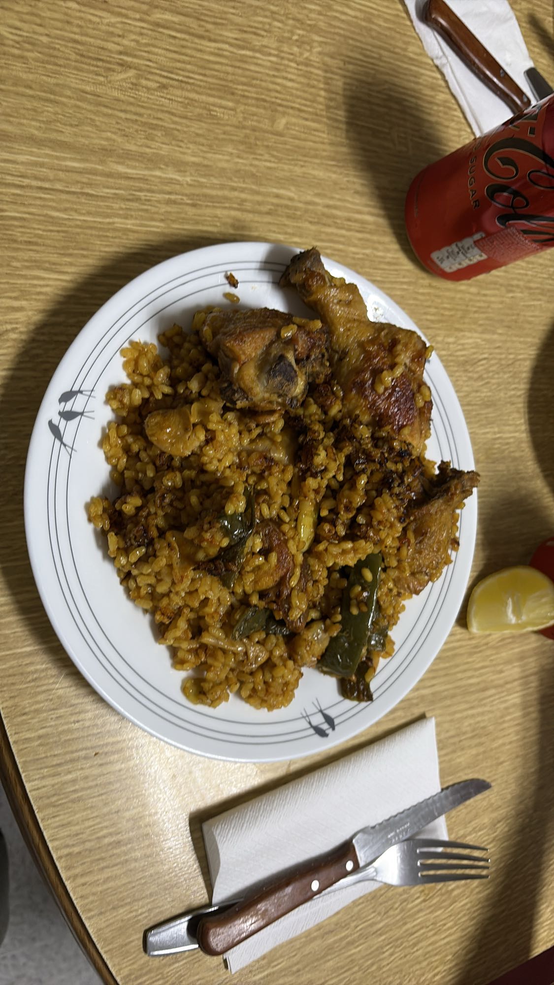 Paella con pollo y judías