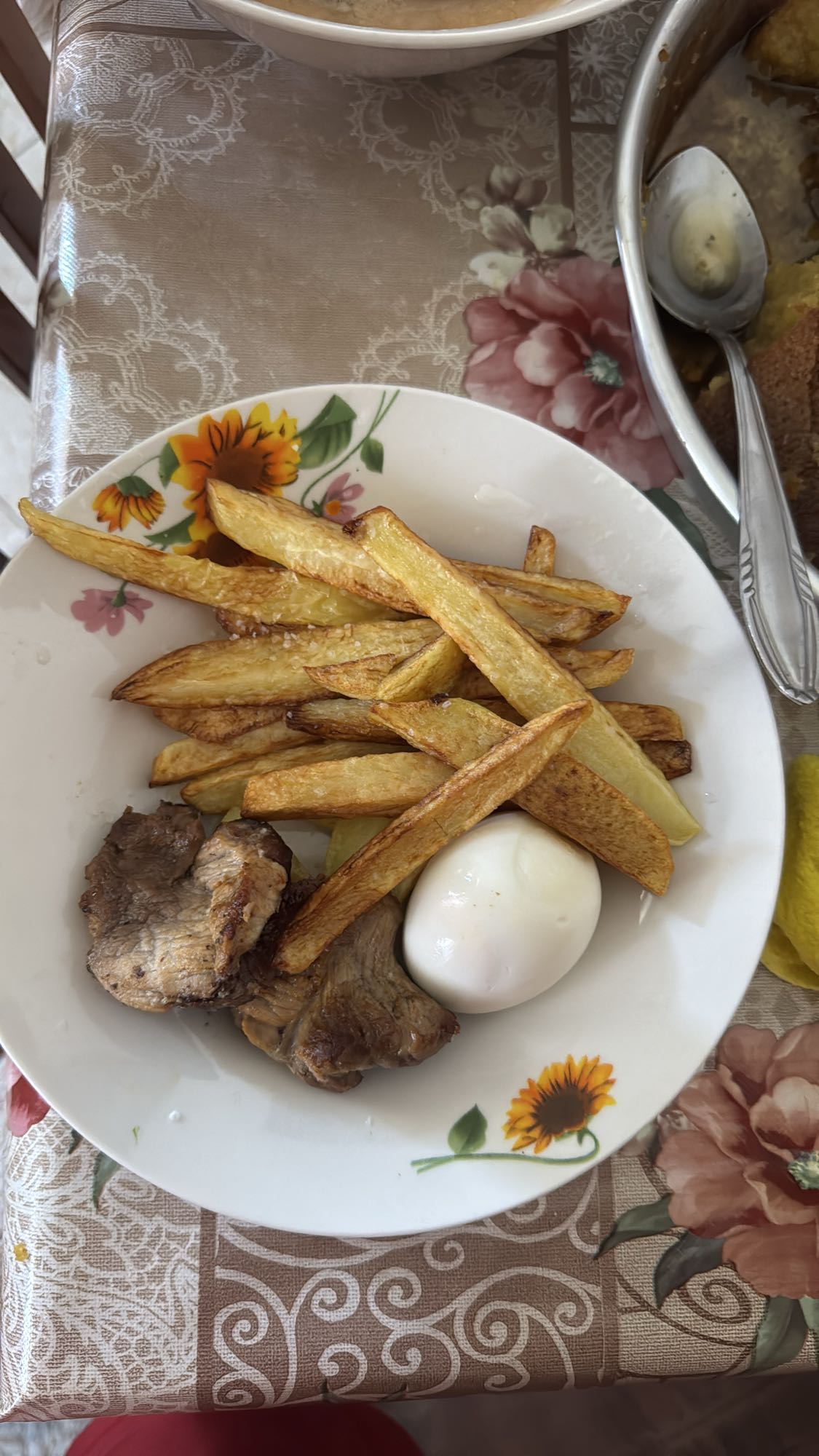 Meat, fries and egg