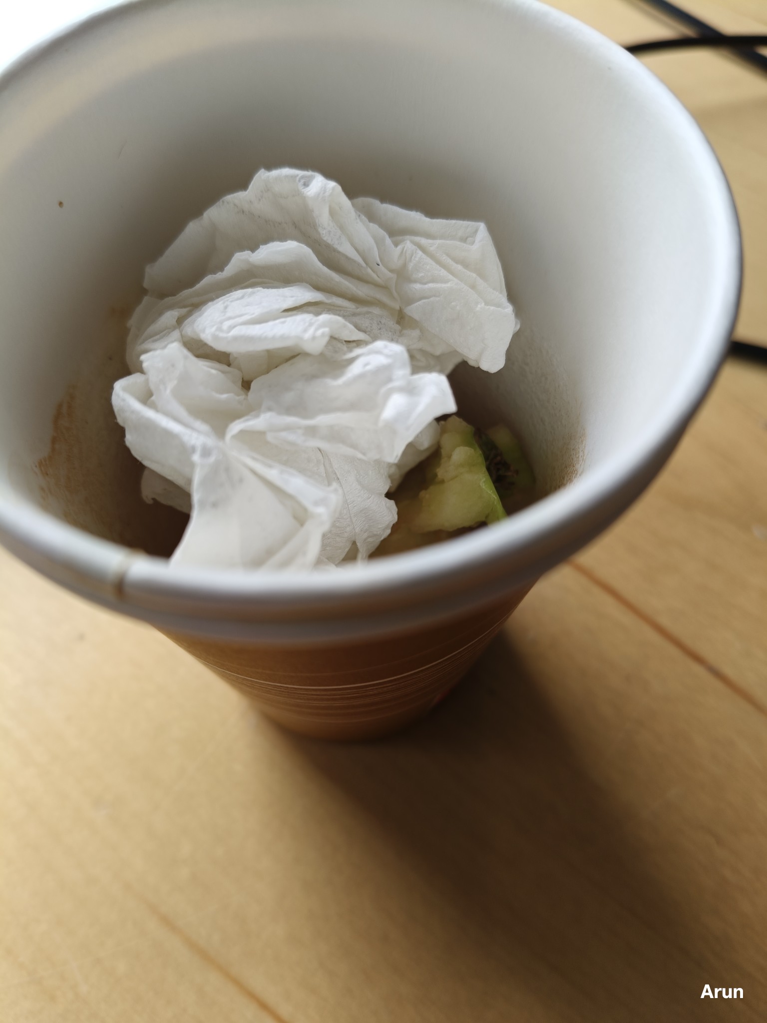 Fruit cup with tissue