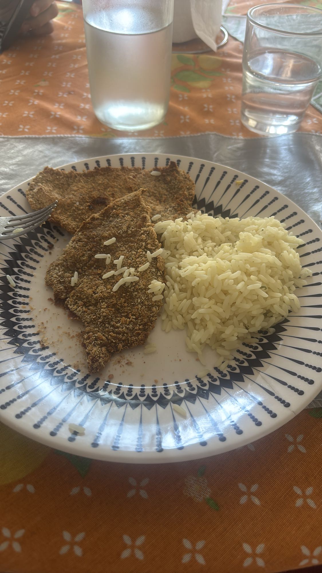 Breaded meat with rice