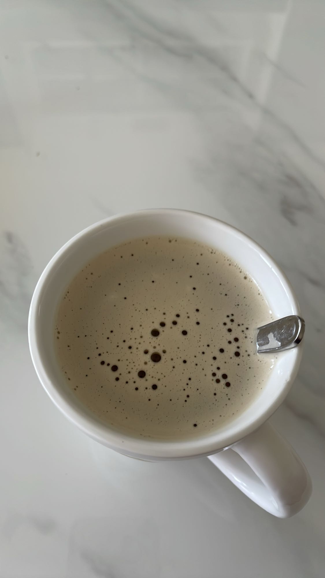 Kopp kaffe med mjölk