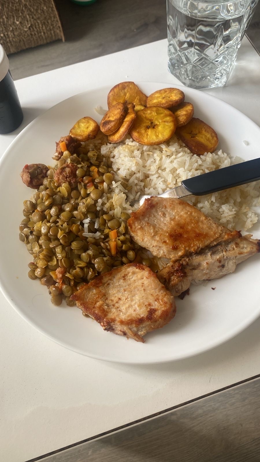 Rice, lentils, pork, plantain