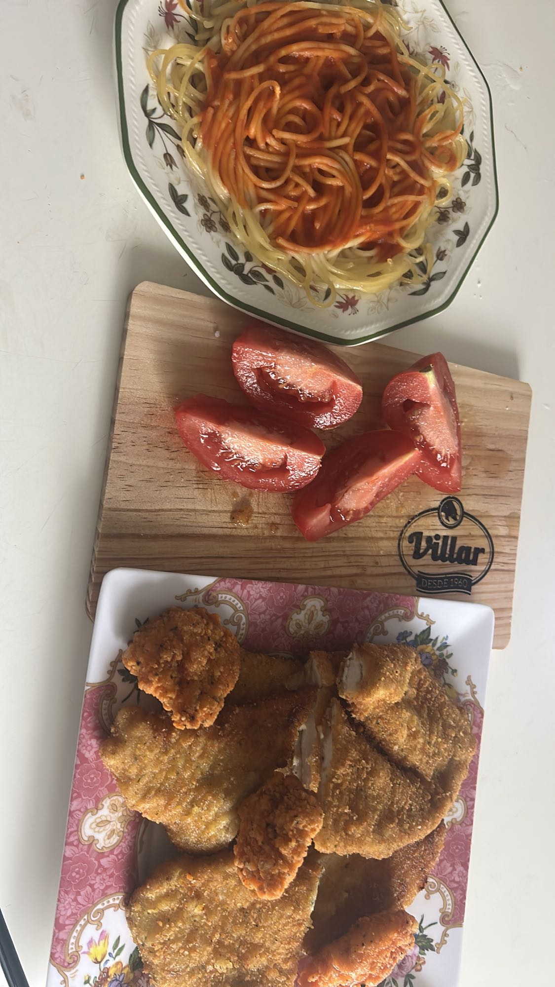 Pollo empanizado con pasta