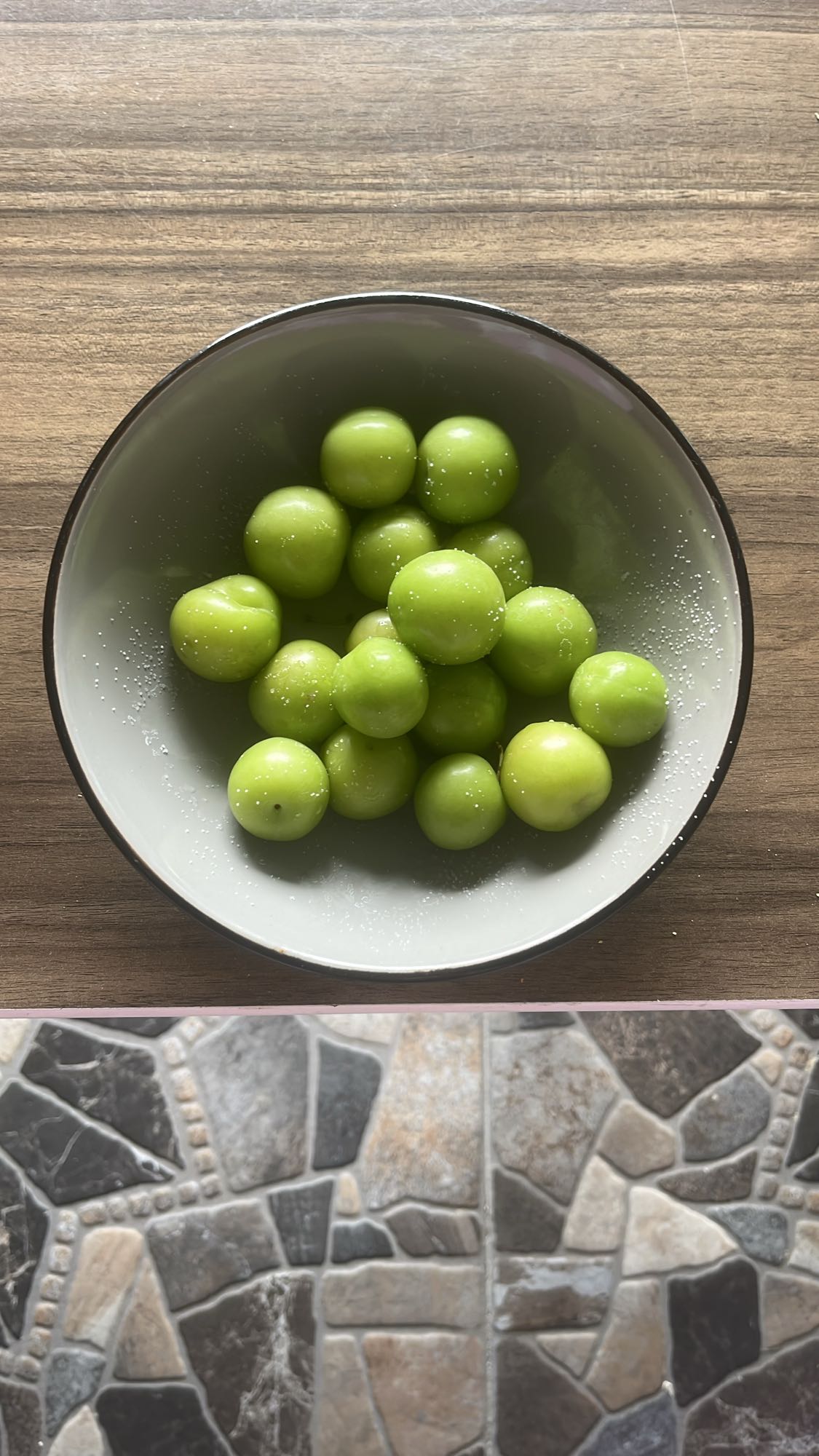 Green plums with salt