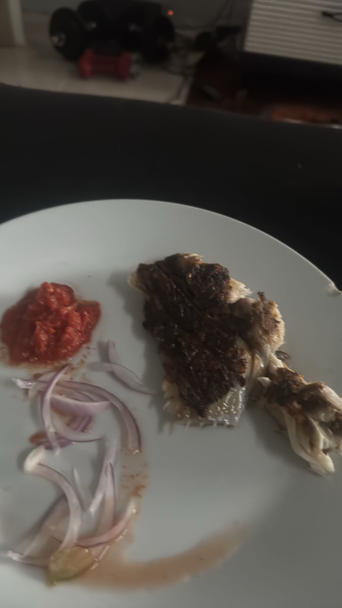 Grilled fish with onions