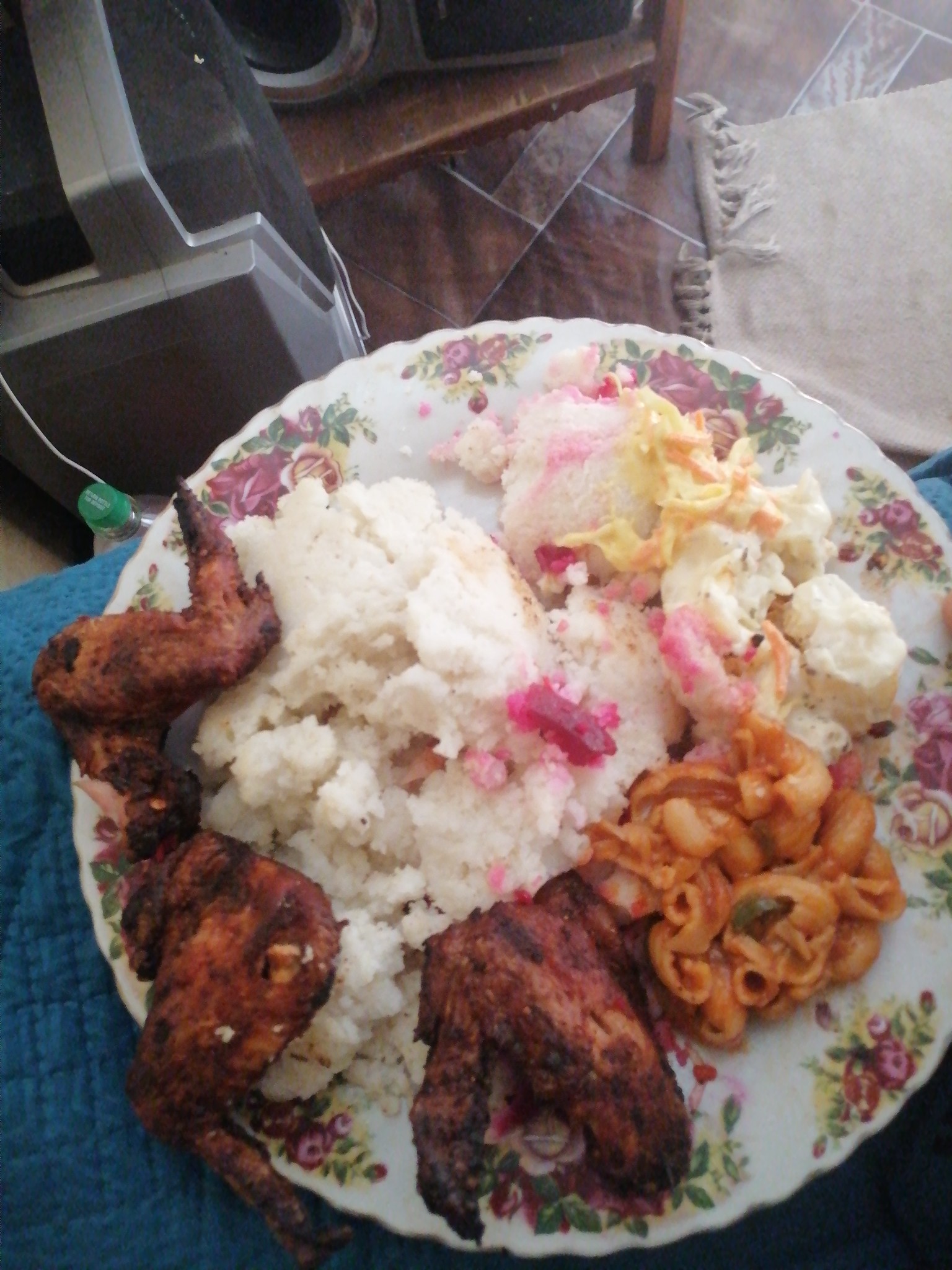 Chicken, ugali, salad, pasta