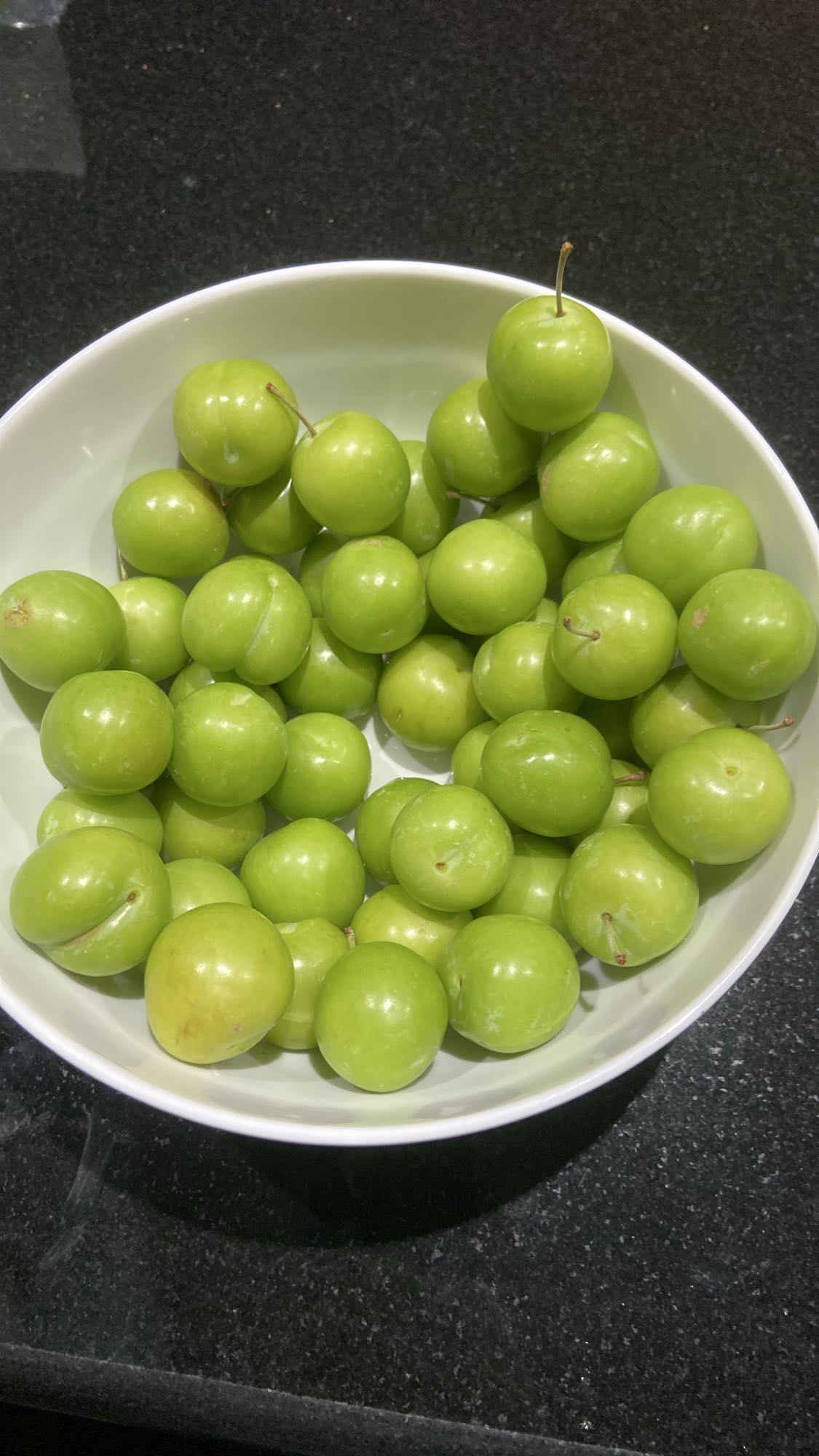 Green plums bowl