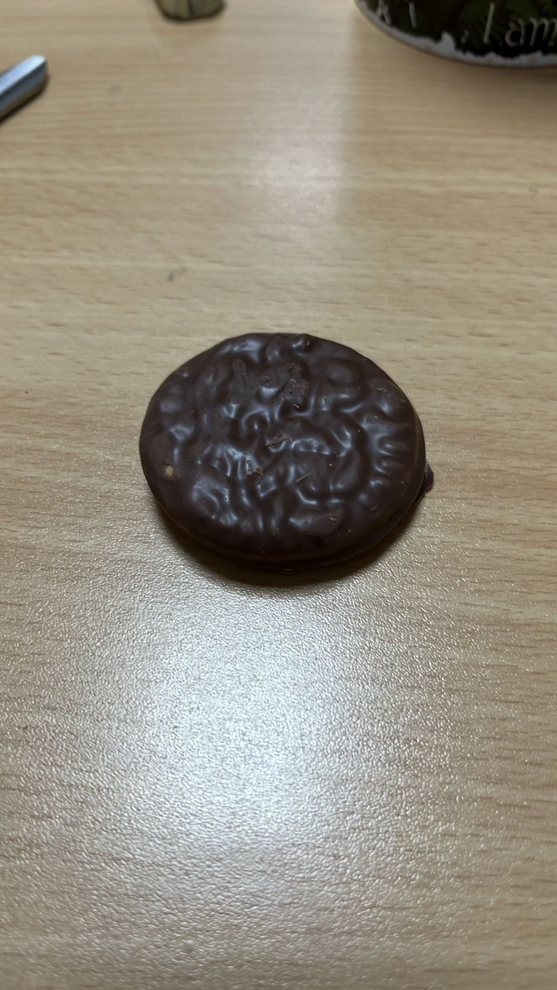 Chocolate coated biscuit