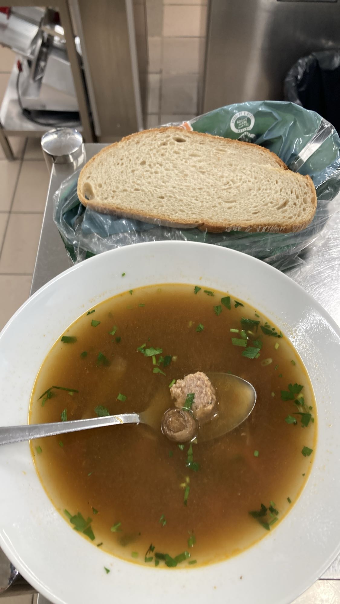 Meatball soup with bread