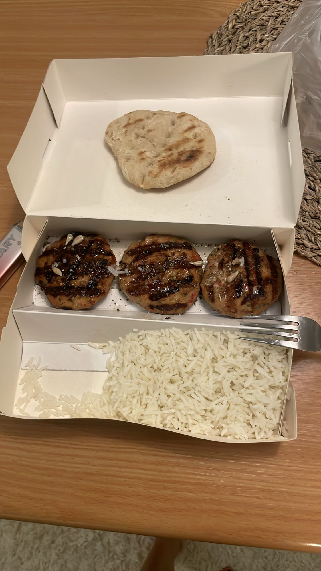Grilled patties with rice and bread