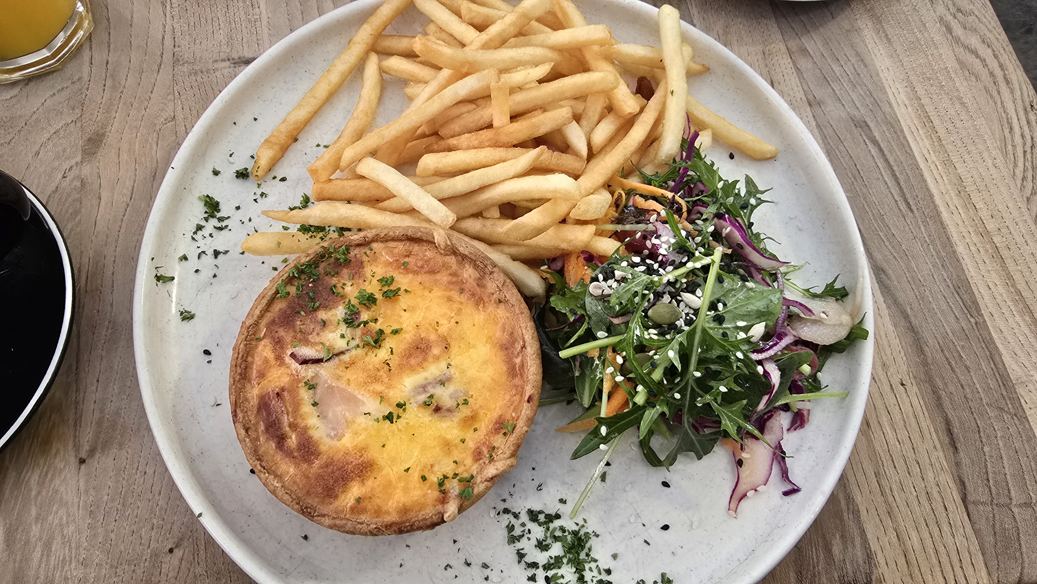 Quiche with fries and salad