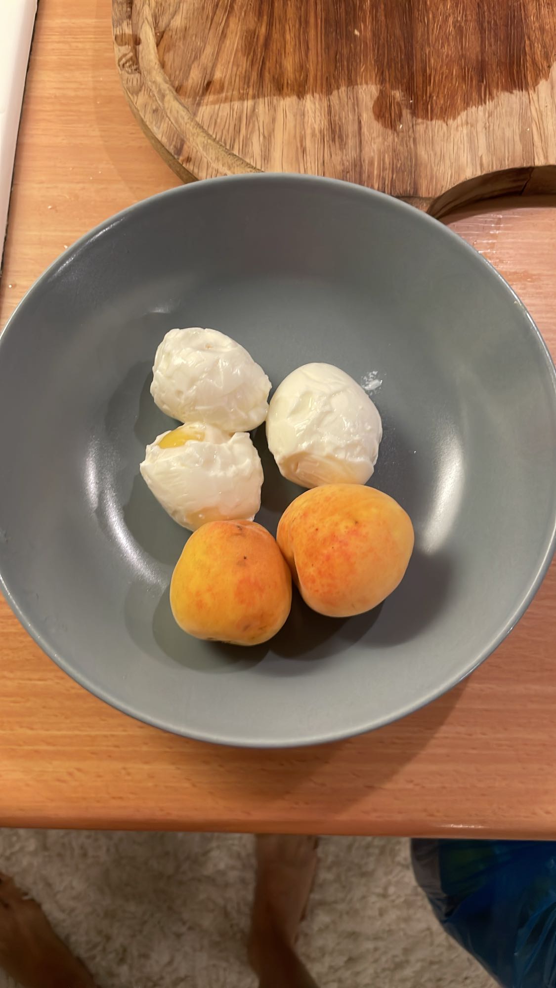 Boiled eggs and apricots