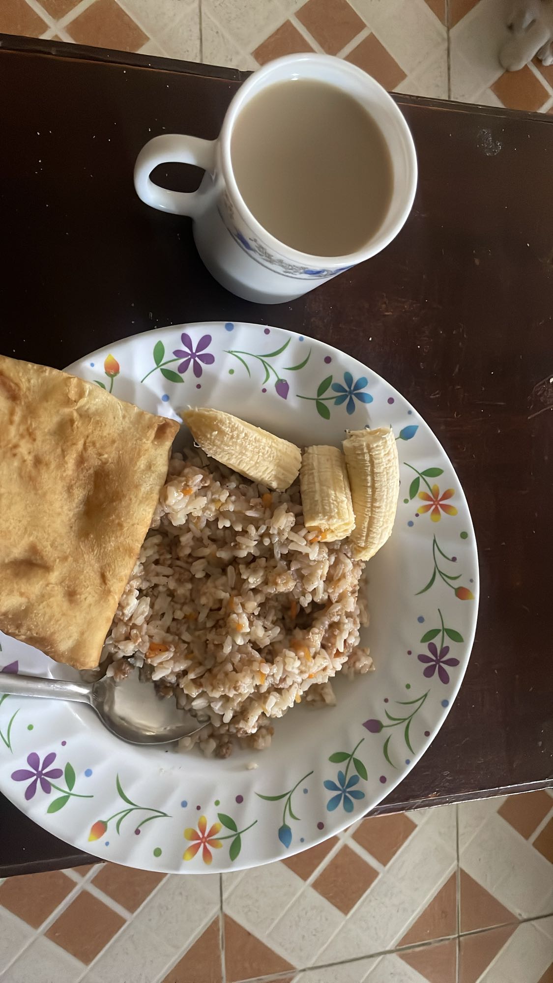 Rice, flatbread, banana, tea