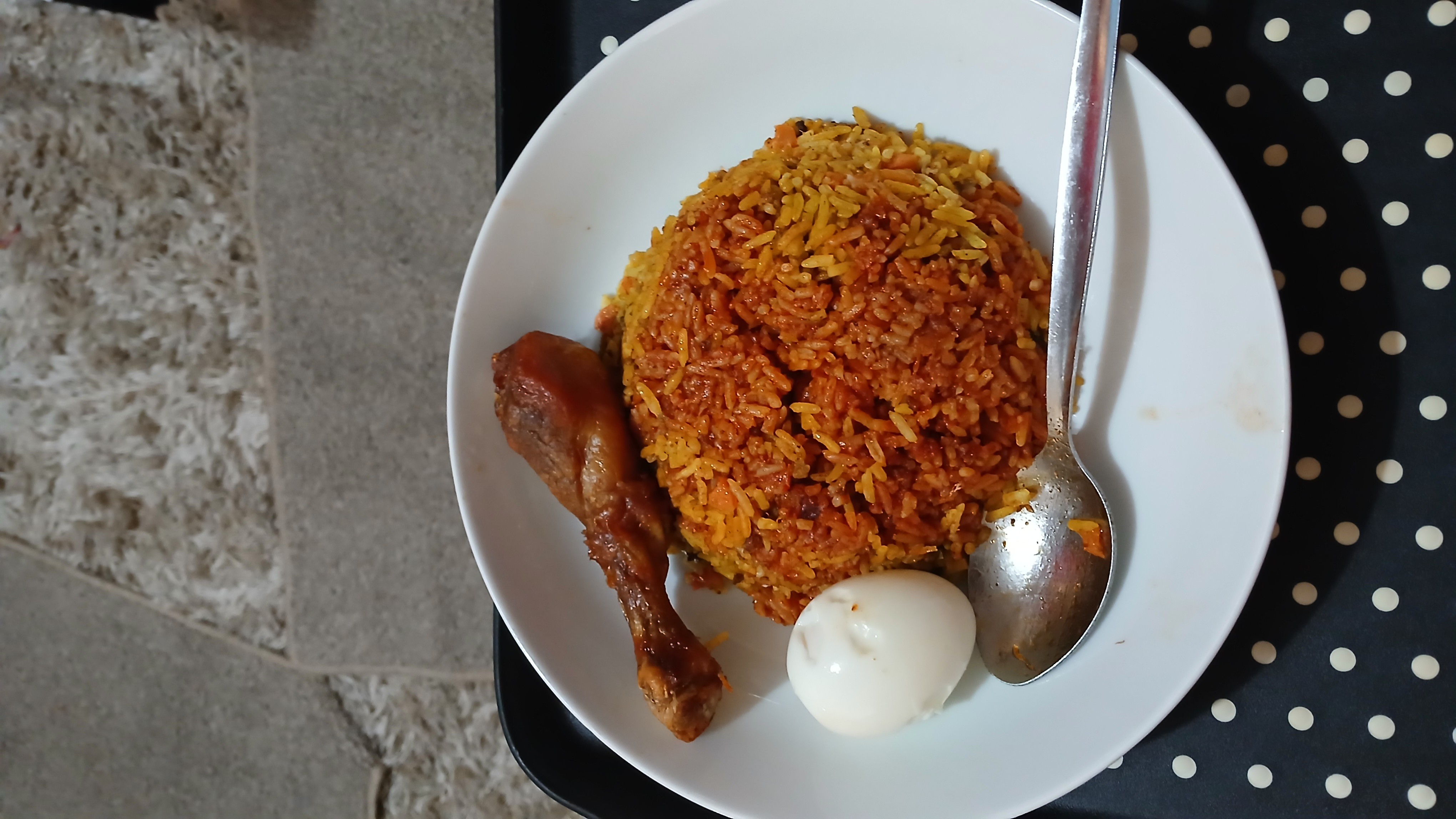 Jollof rice with chicken and egg