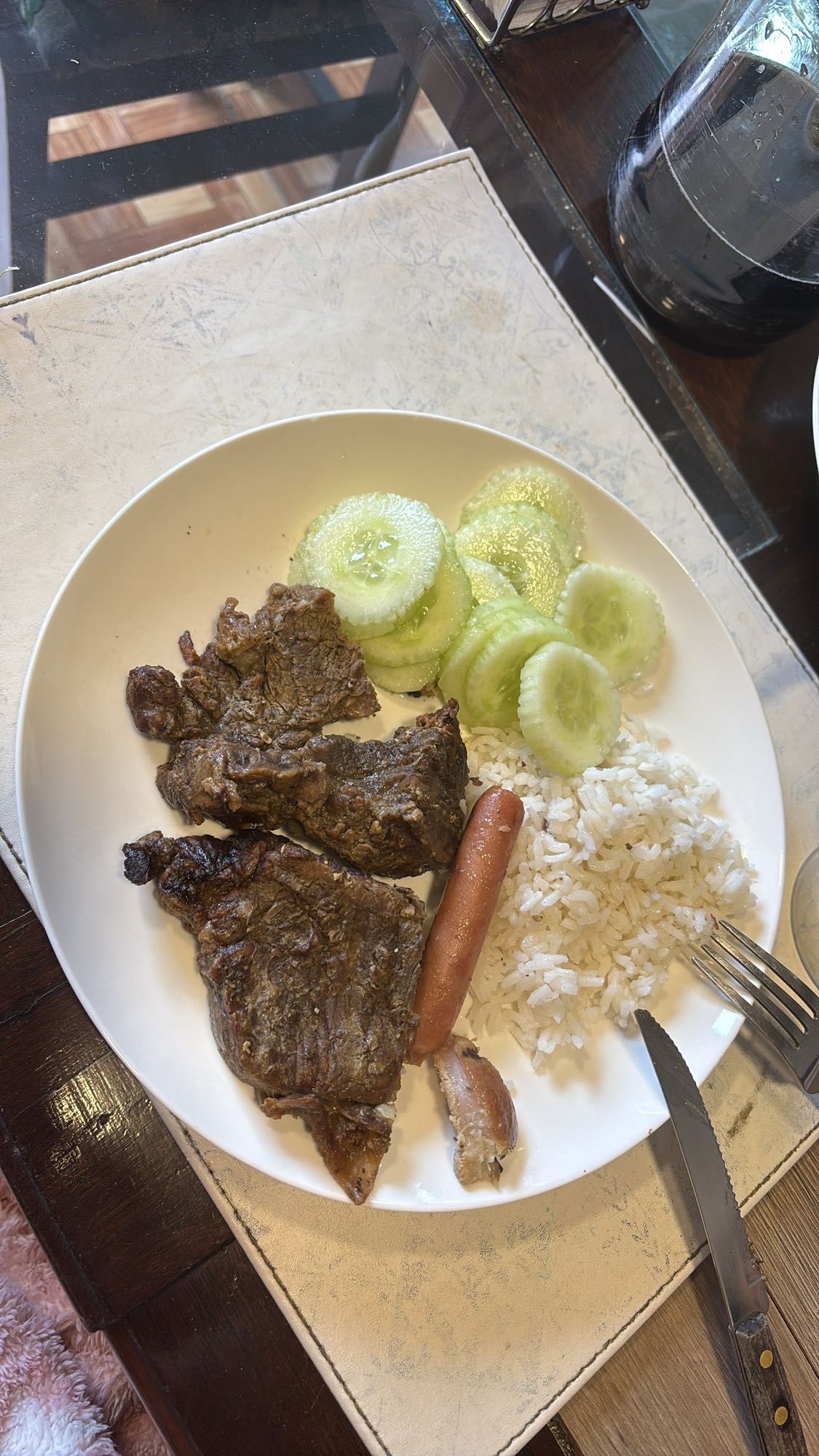 Plato de carne y arroz