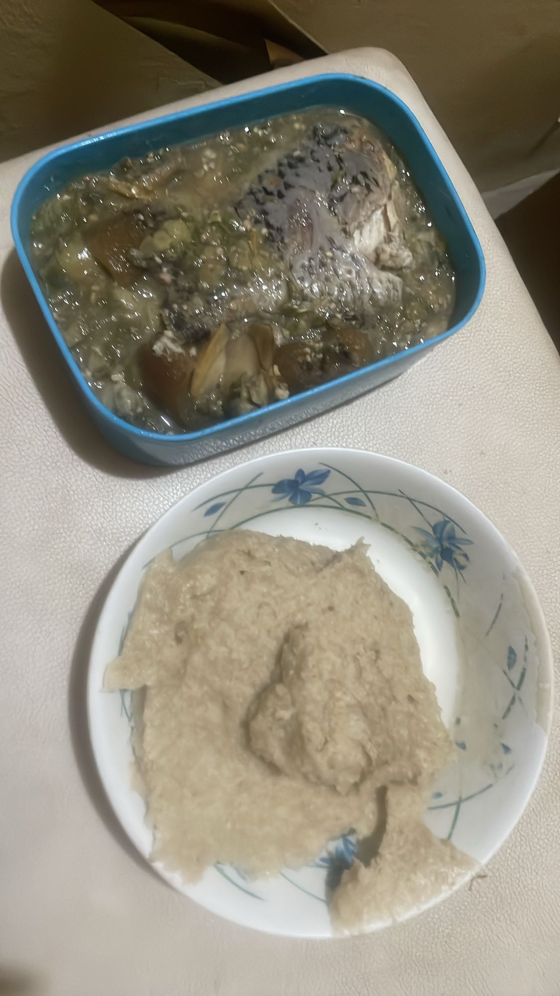 Oat swallow with sea food okra soup