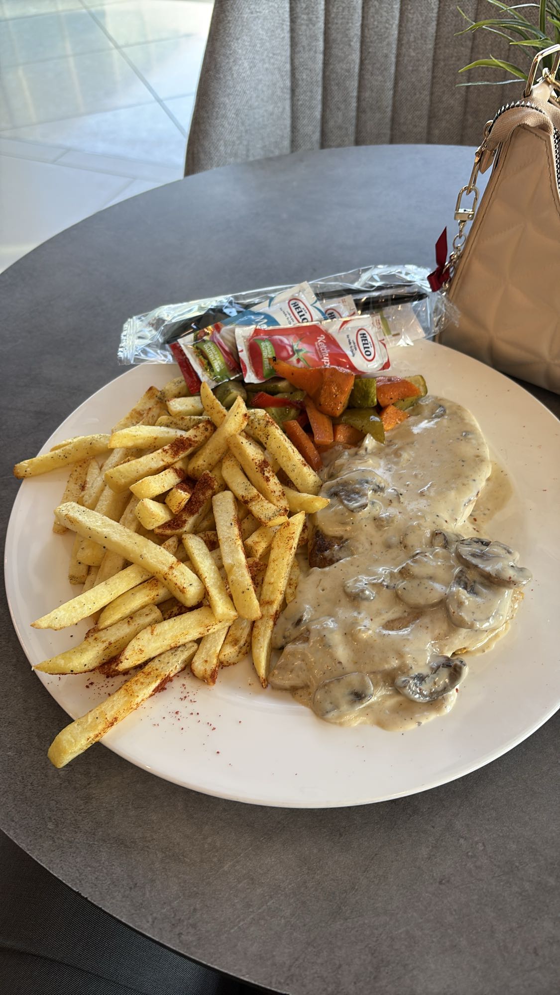 Chicken with mushroom sauce and fries