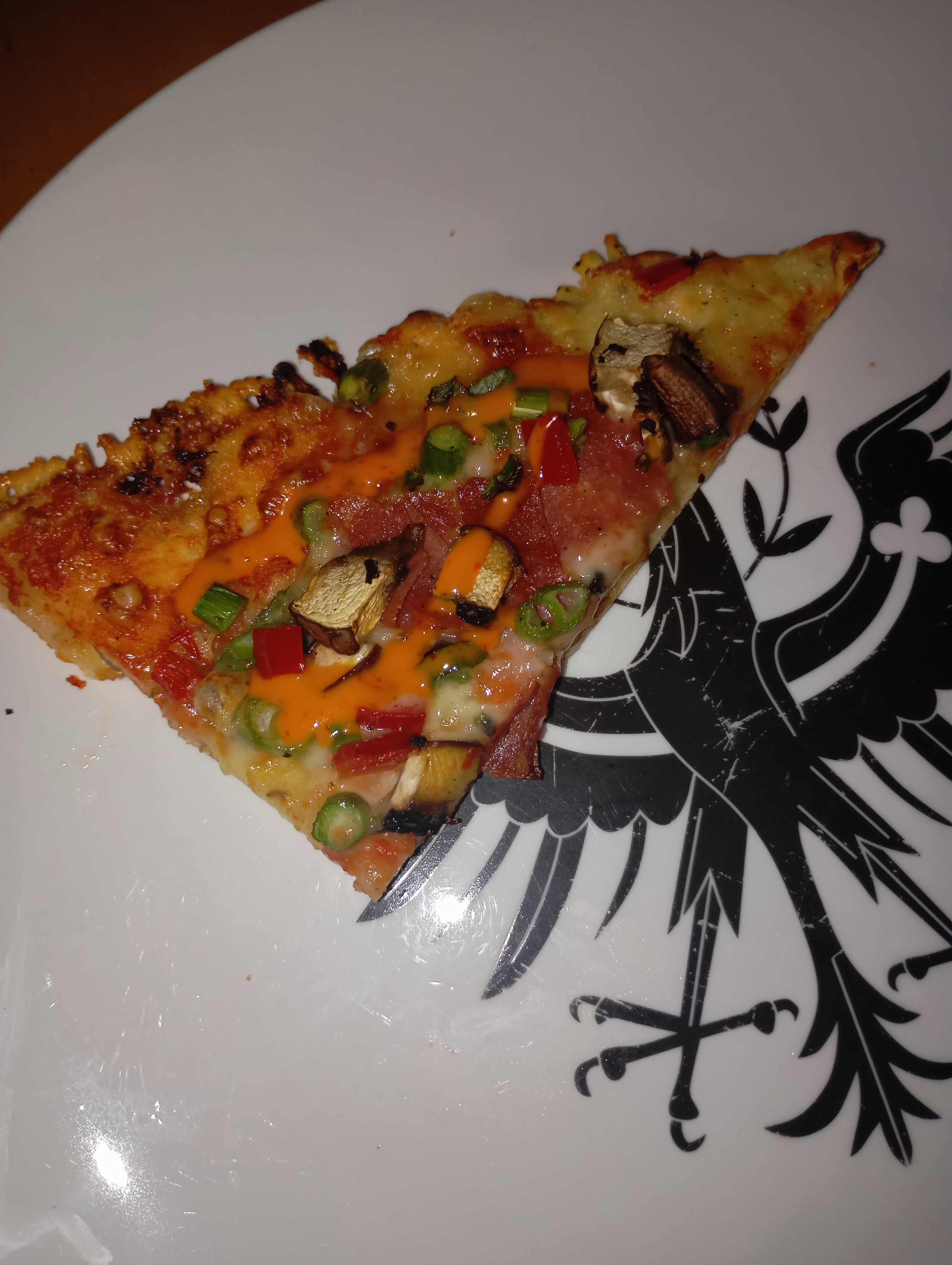 Pizza slice with veggies