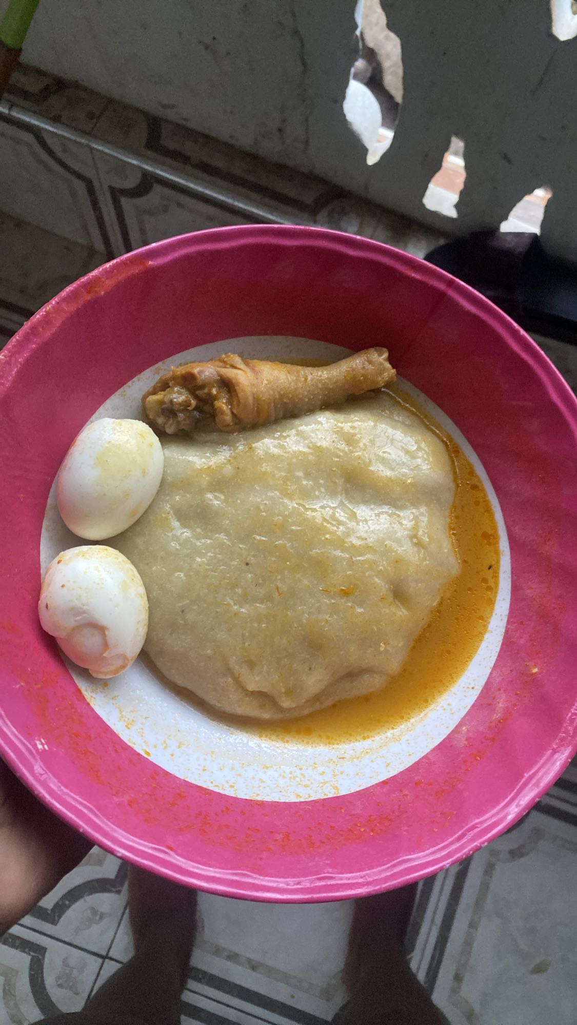 Fufu with chicken and eggs