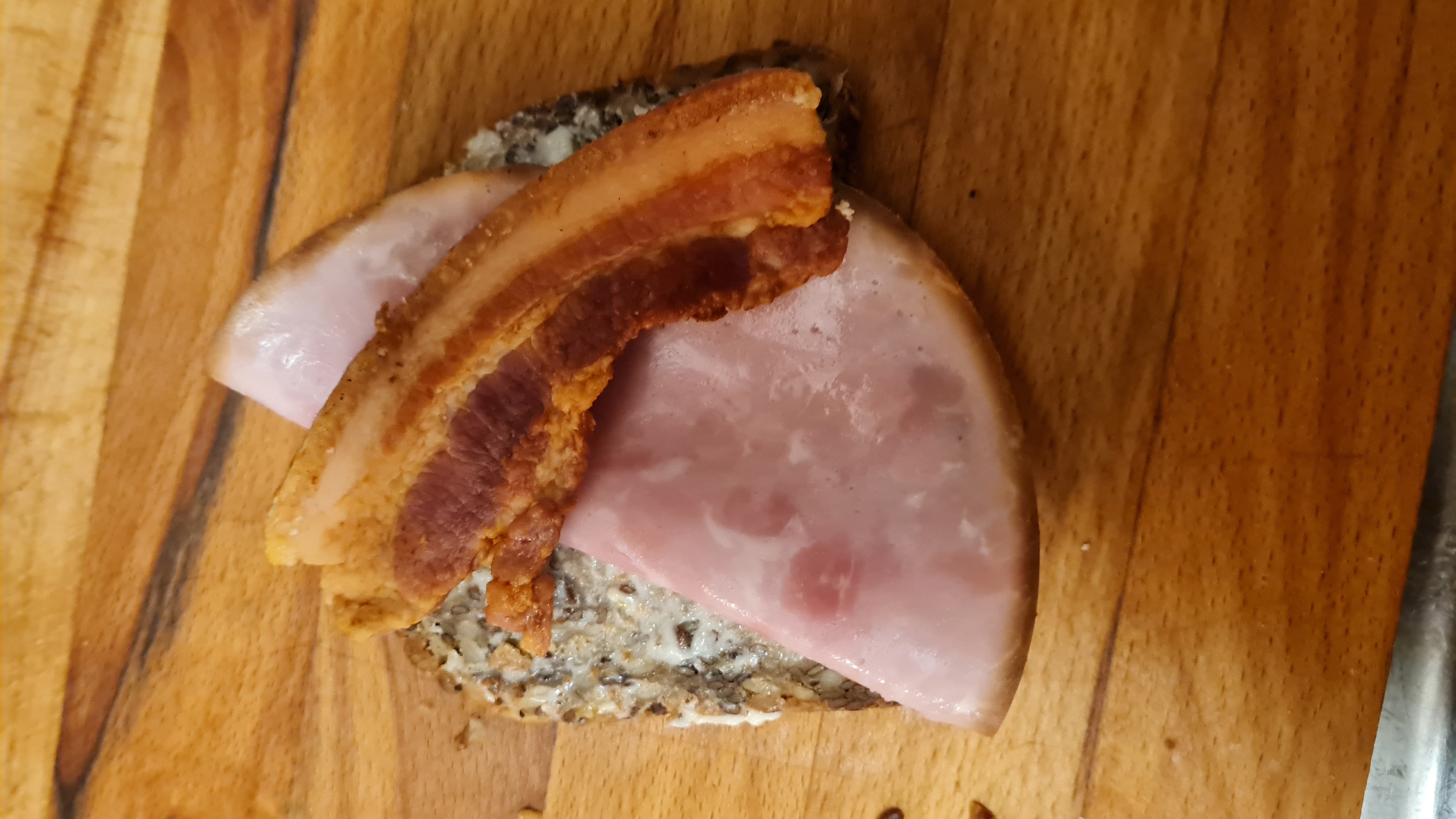 Ham and bacon open sandwich