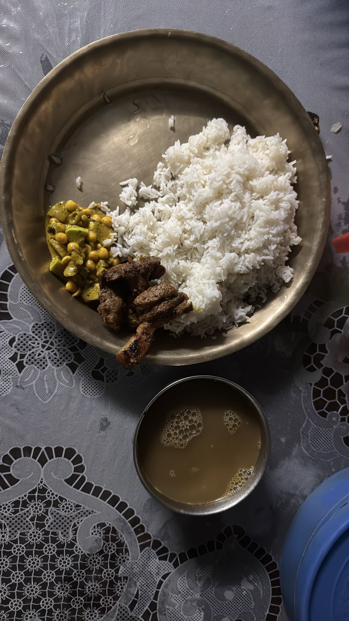 Rice, curry, mutton, tea