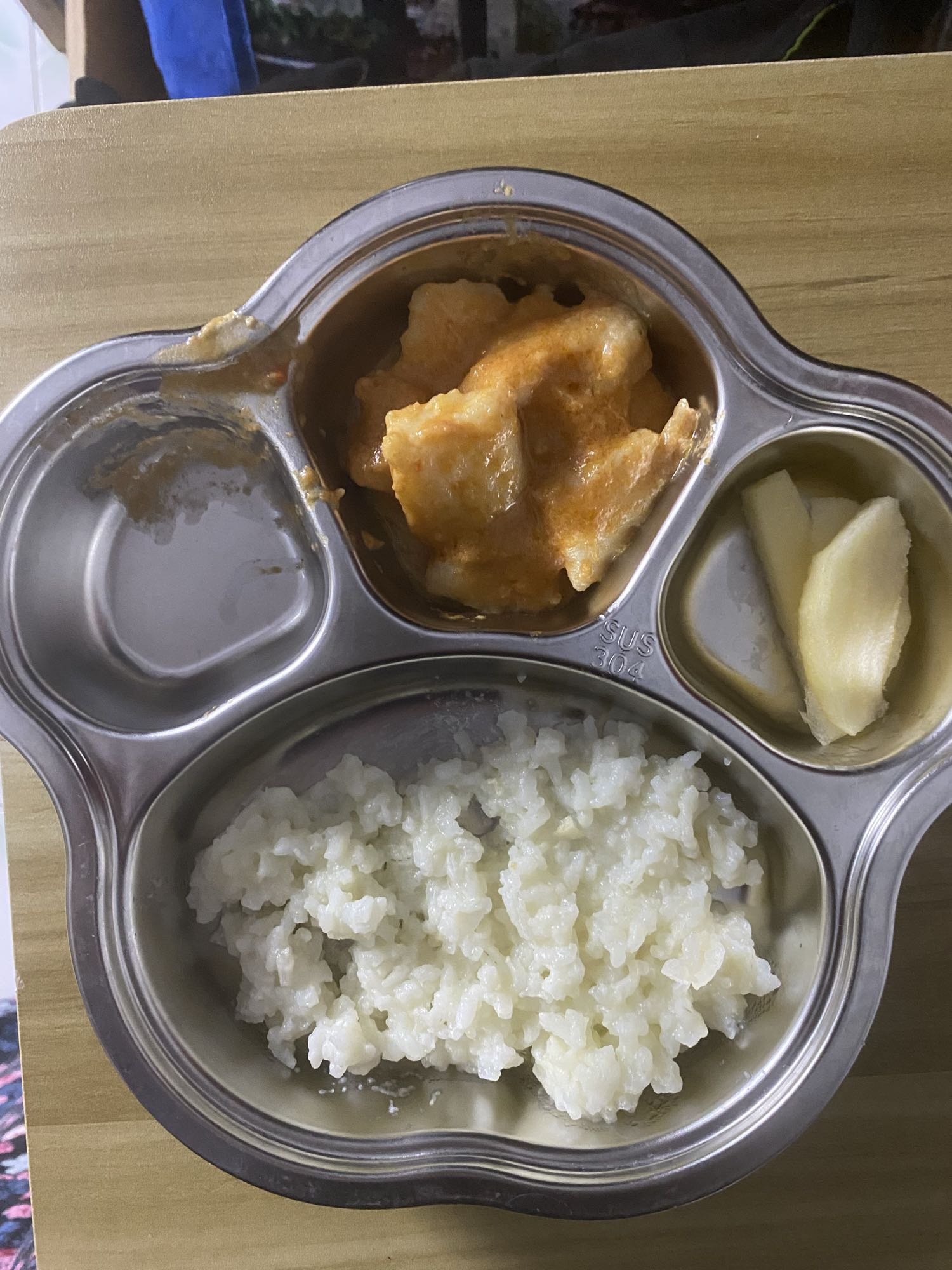 Steamed rice with quail egg and dory in coconut tomato sauce