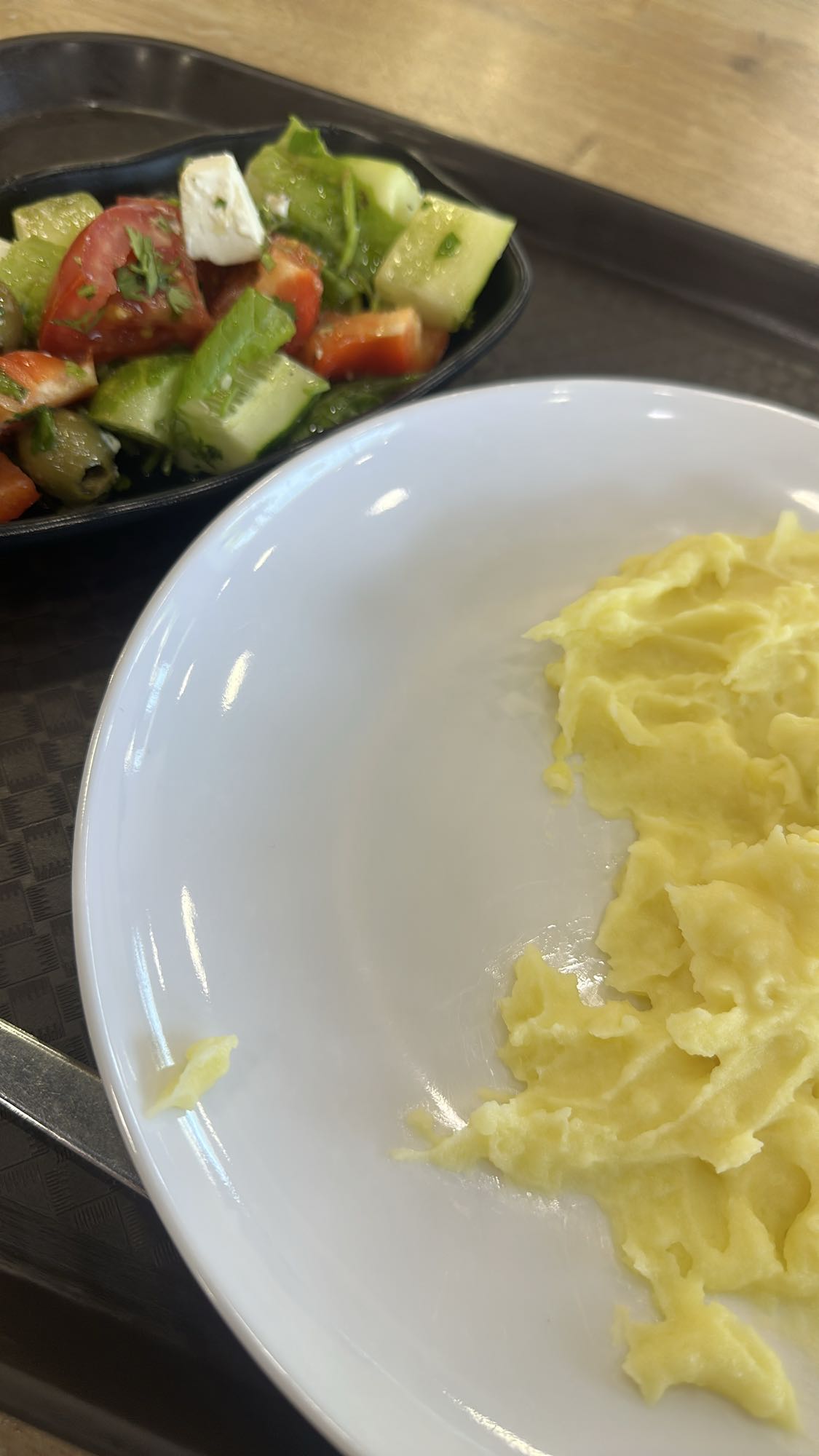 Scrambled eggs and salad