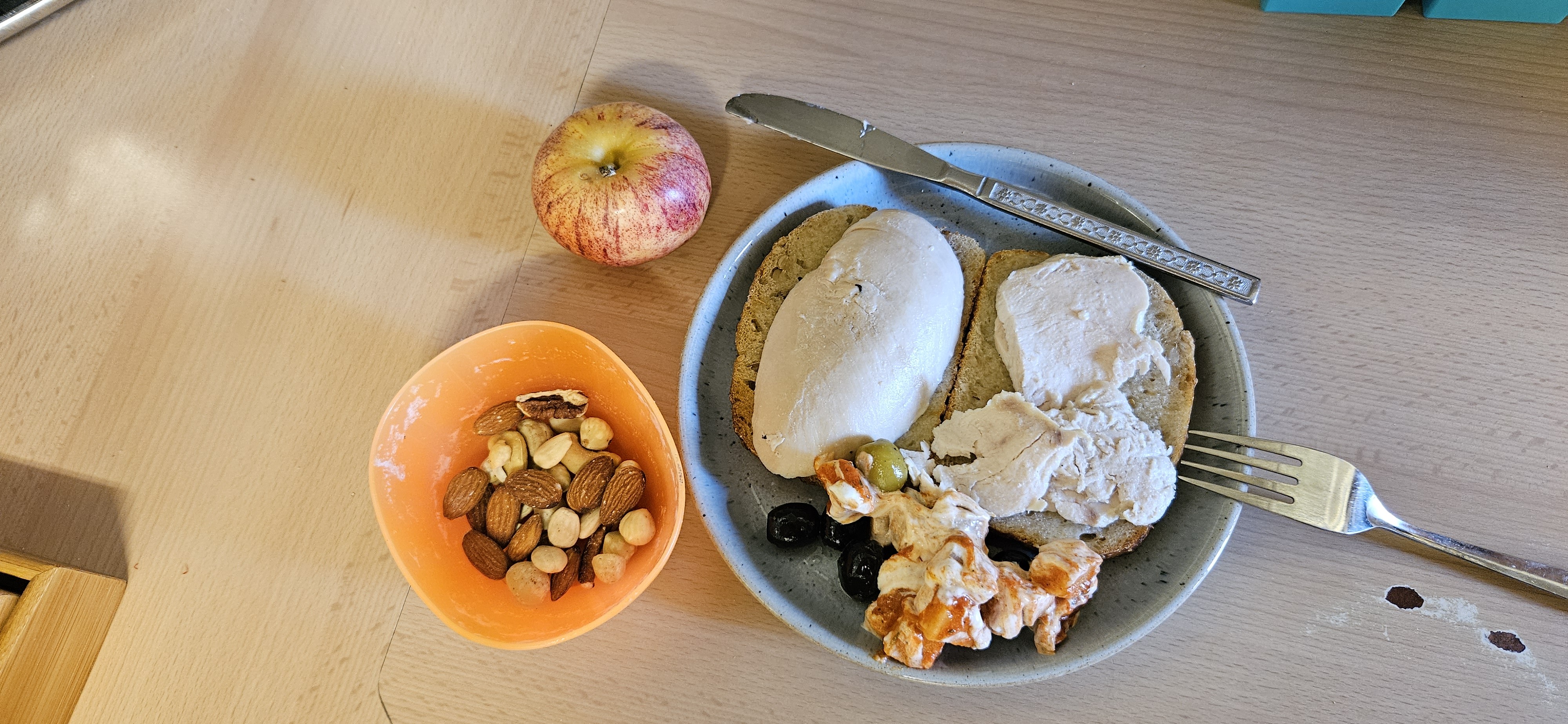Chicken bread apple nuts plate