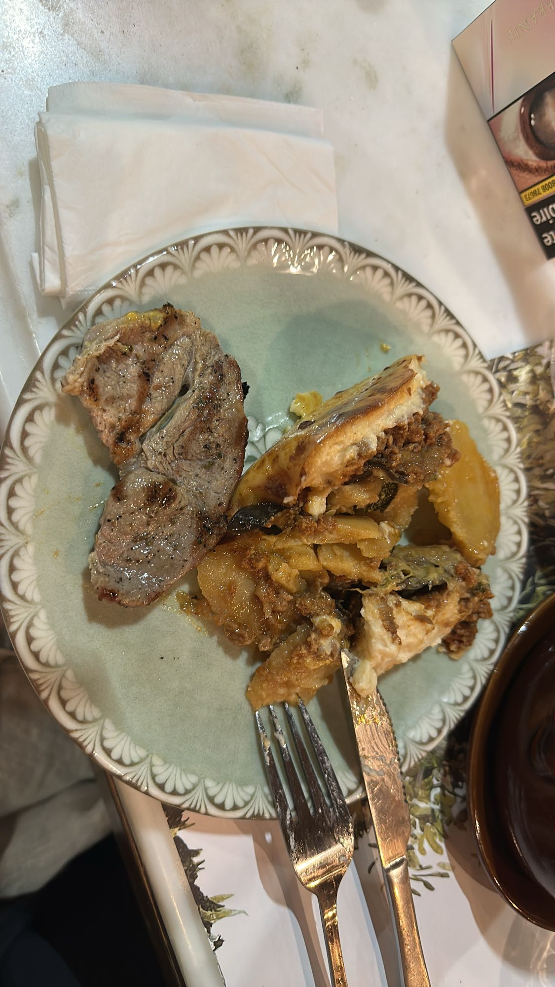 Grilled meat with moussaka