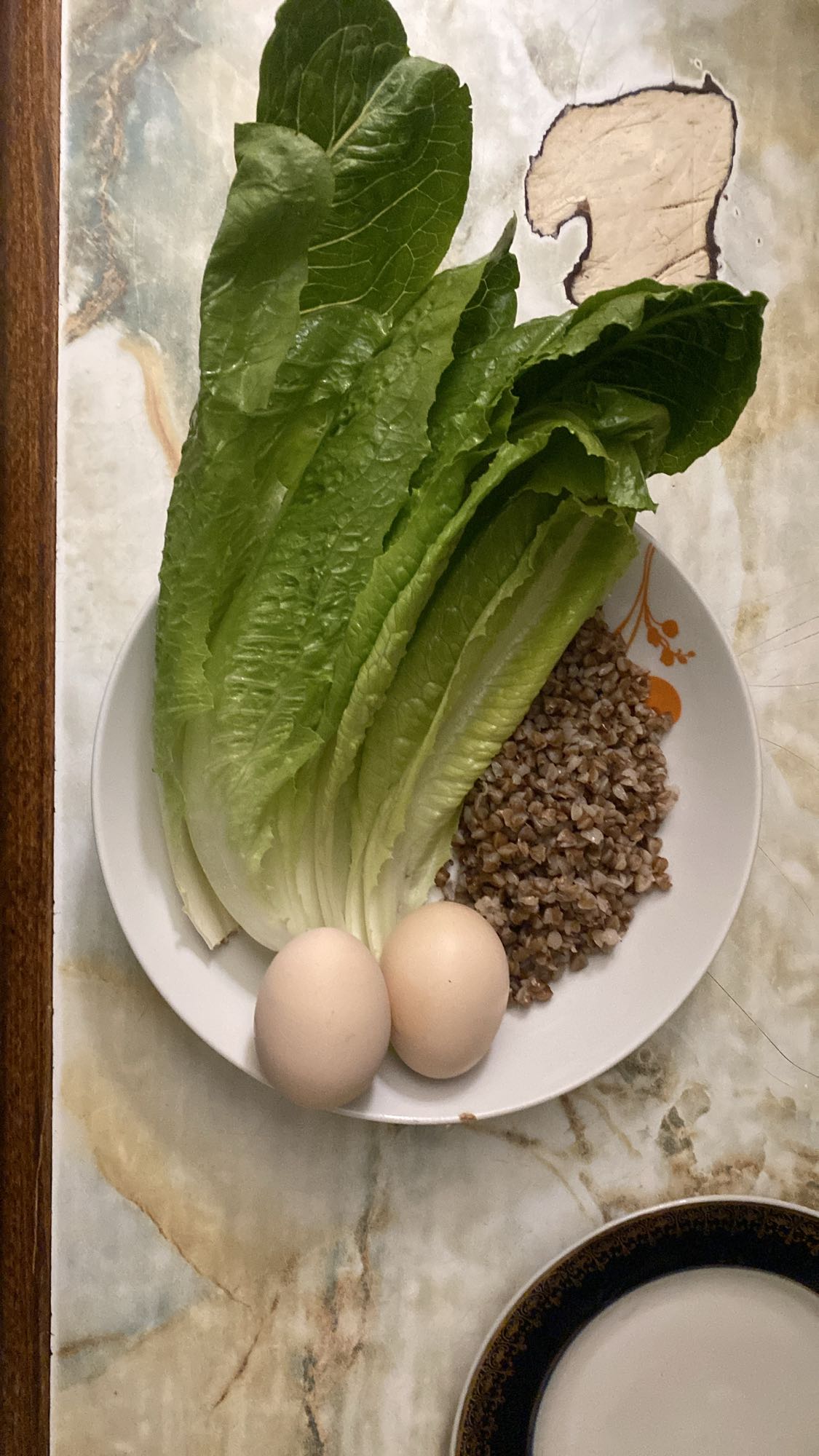 Eggs, buckwheat, lettuce plate