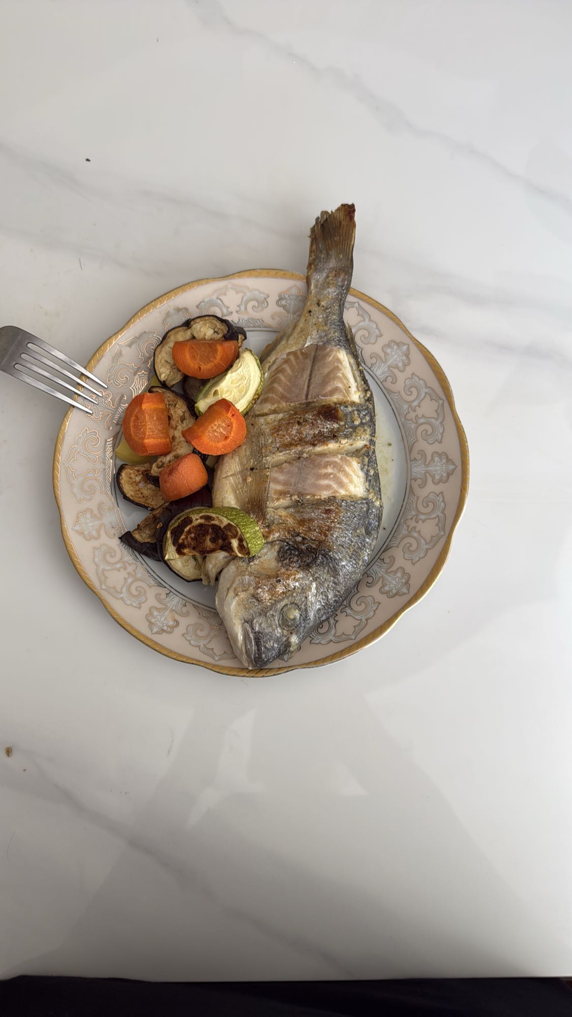 Запечённая рыба с овощами