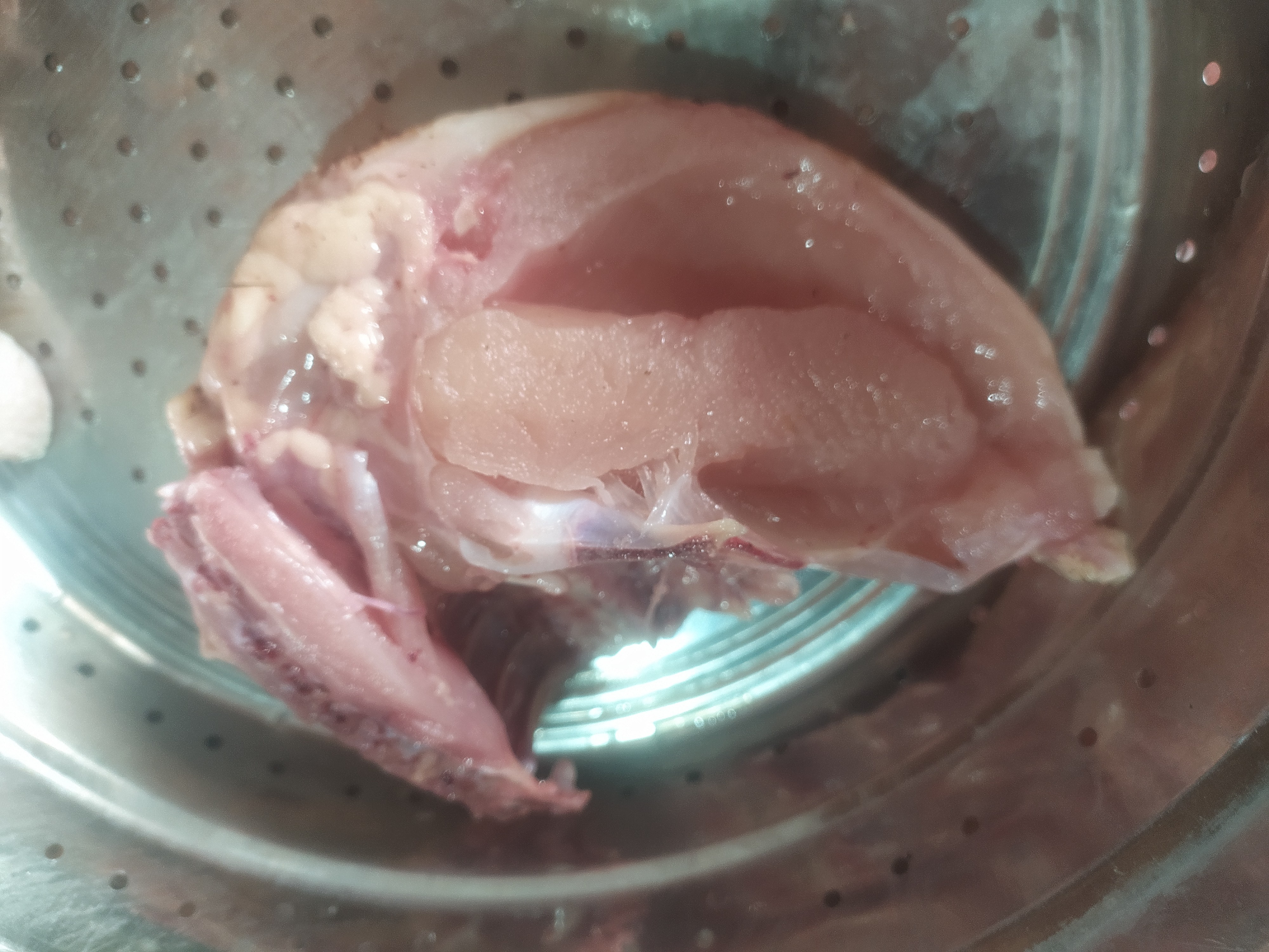Raw chicken thigh