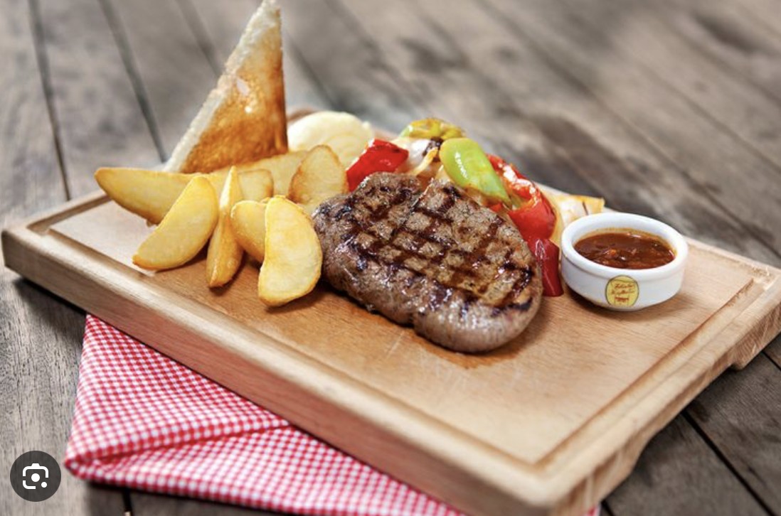 Grilled steak with sides