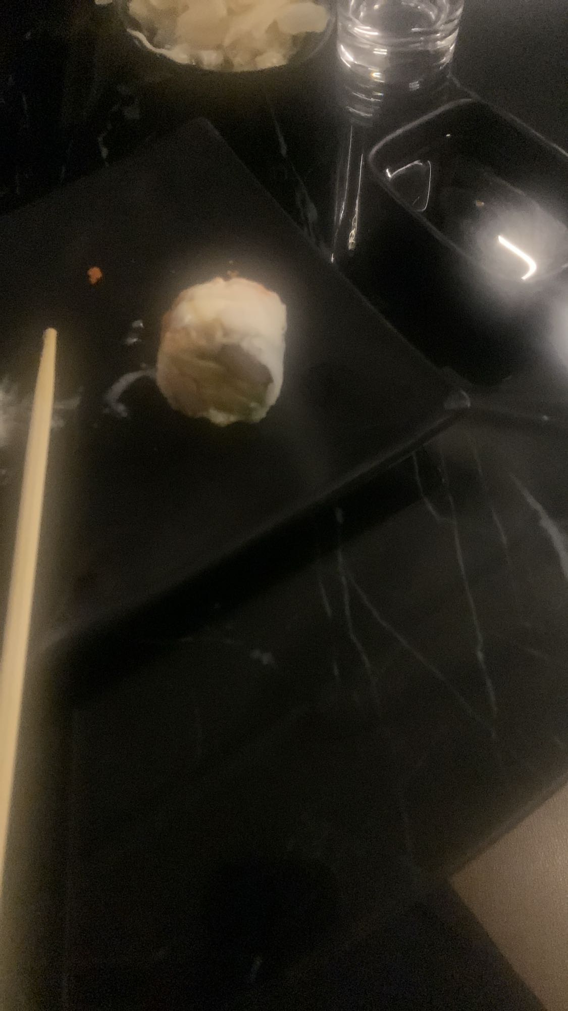 Single sushi roll piece