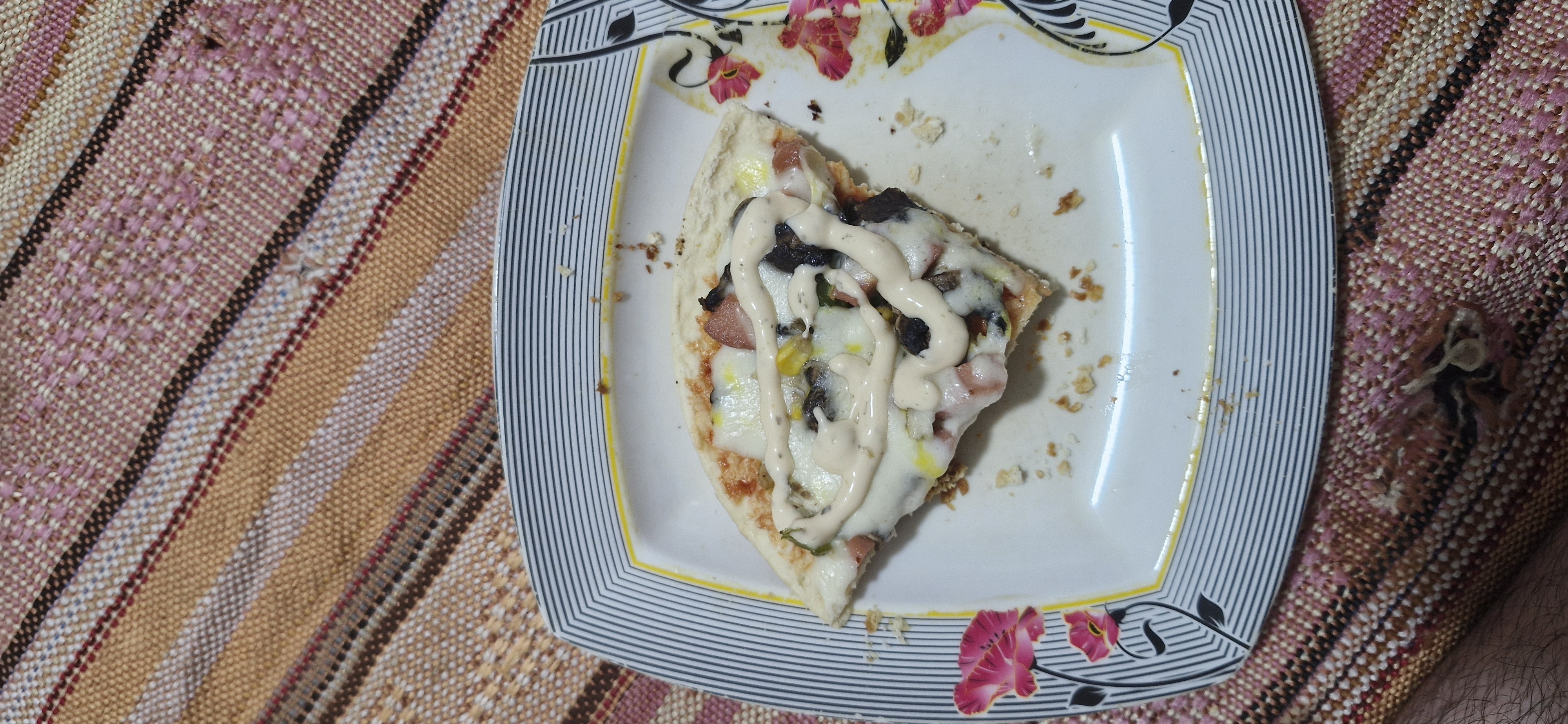 Pizza slice with sauce