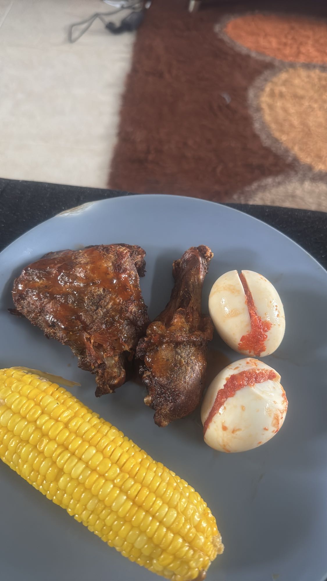 Grilled meat, eggs & corn