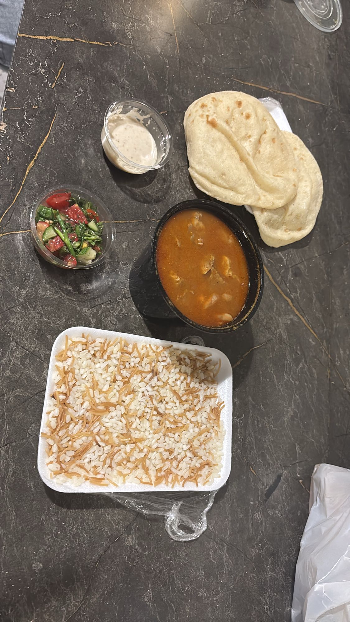 Chicken stew with rice and bread