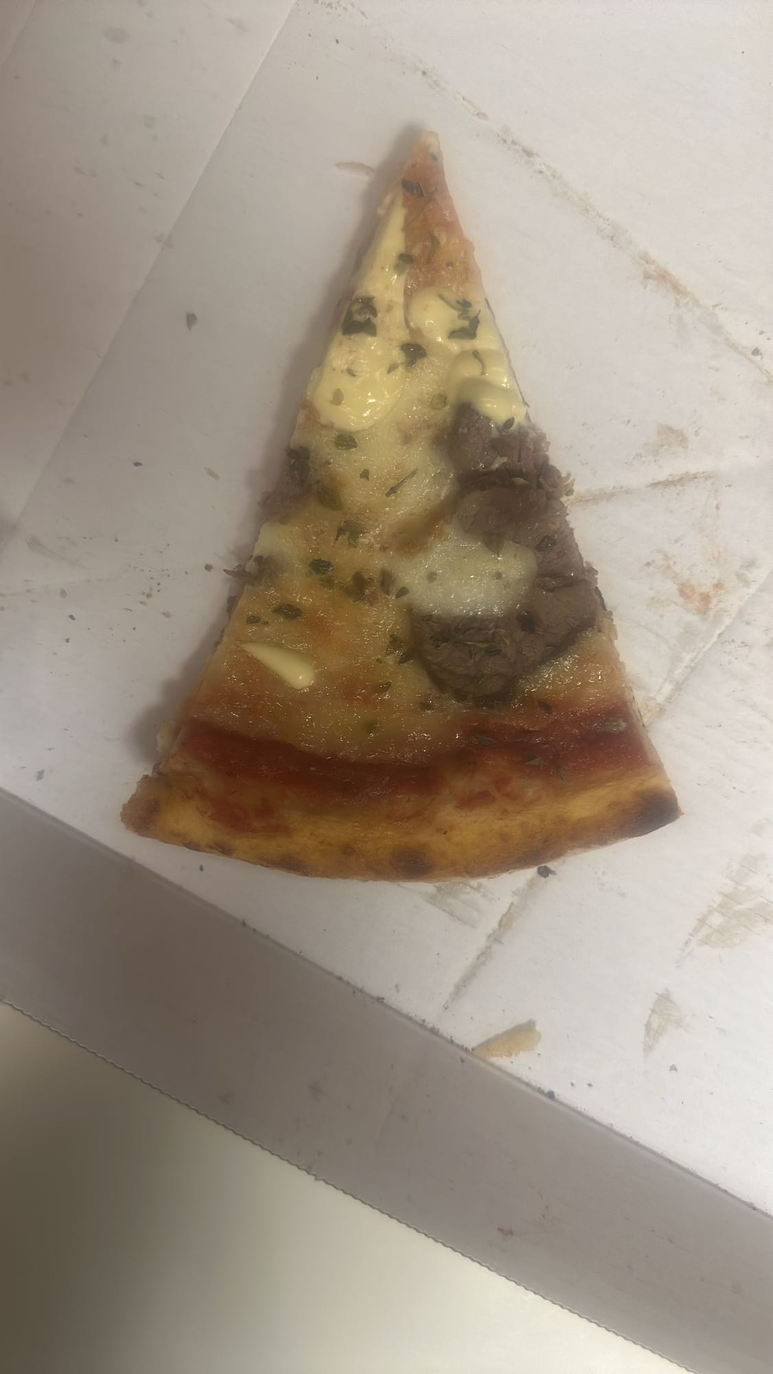 Köttpizza skiva