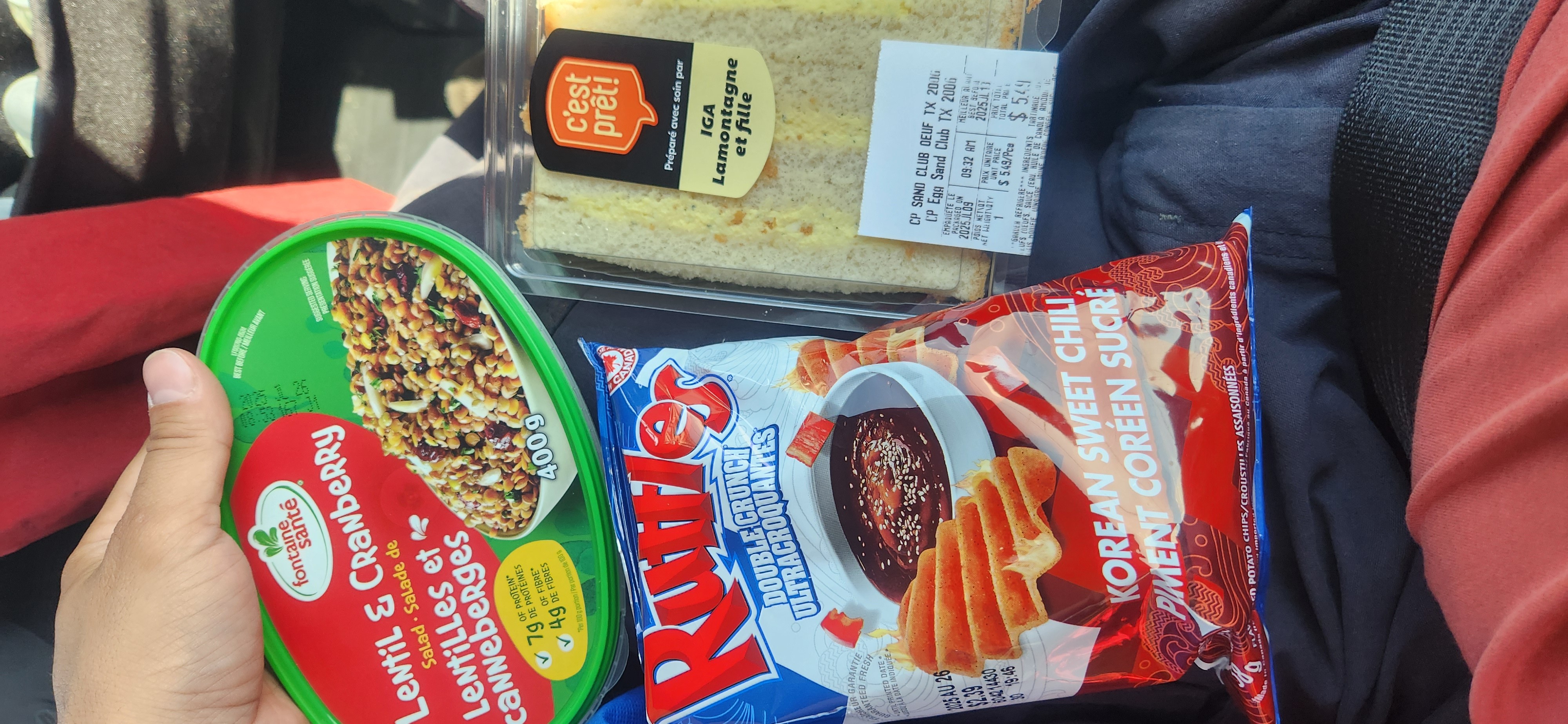 Egg sandwich, chips, lentil salad