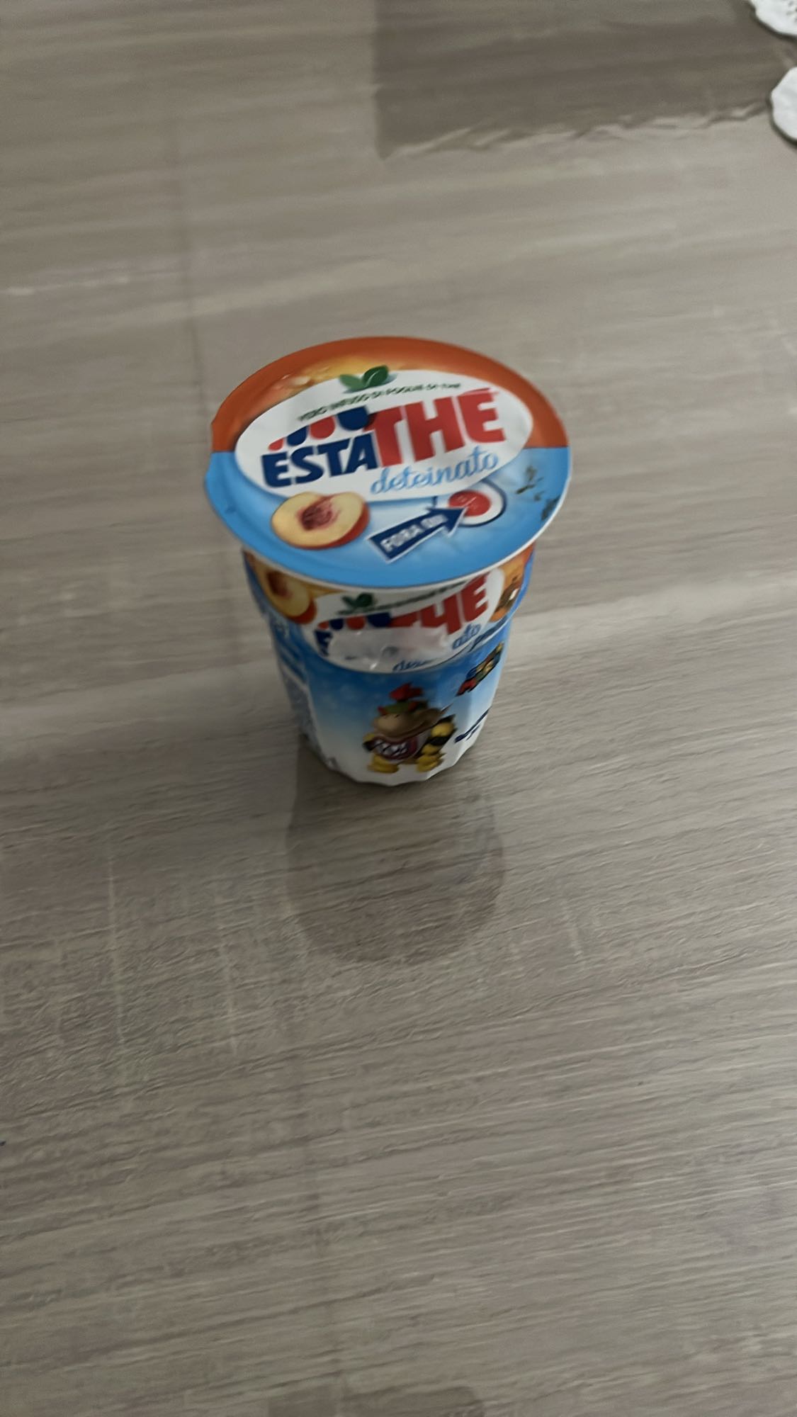 Estathé pesca deteinato