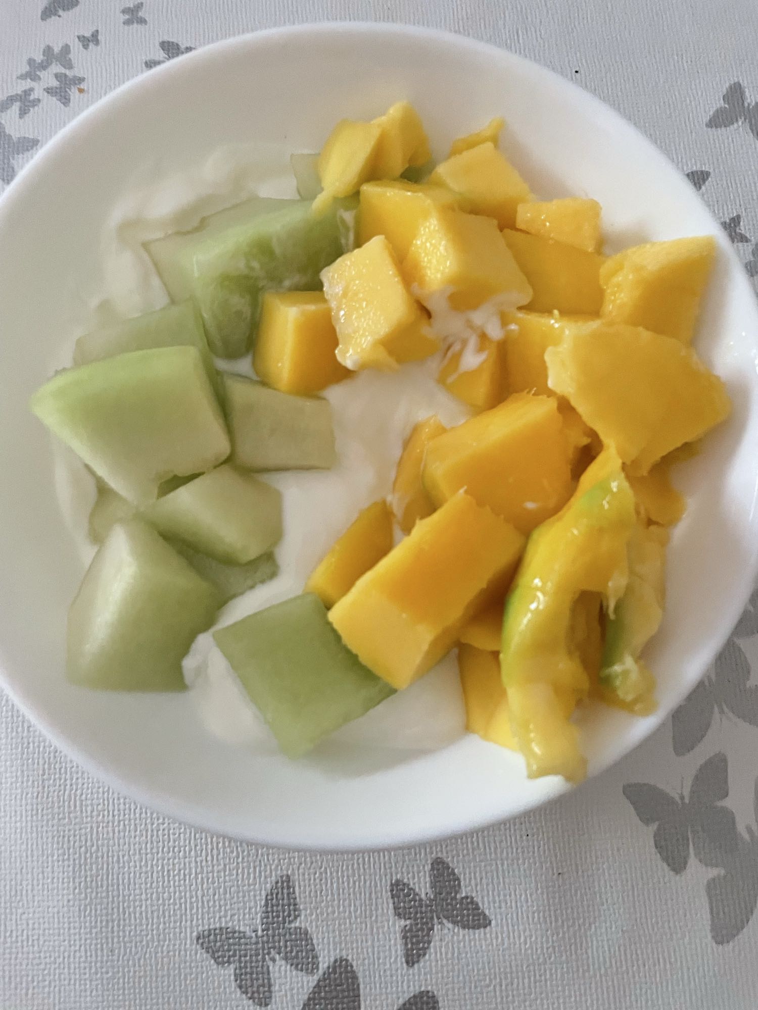 Yoghurt met meloen en mango