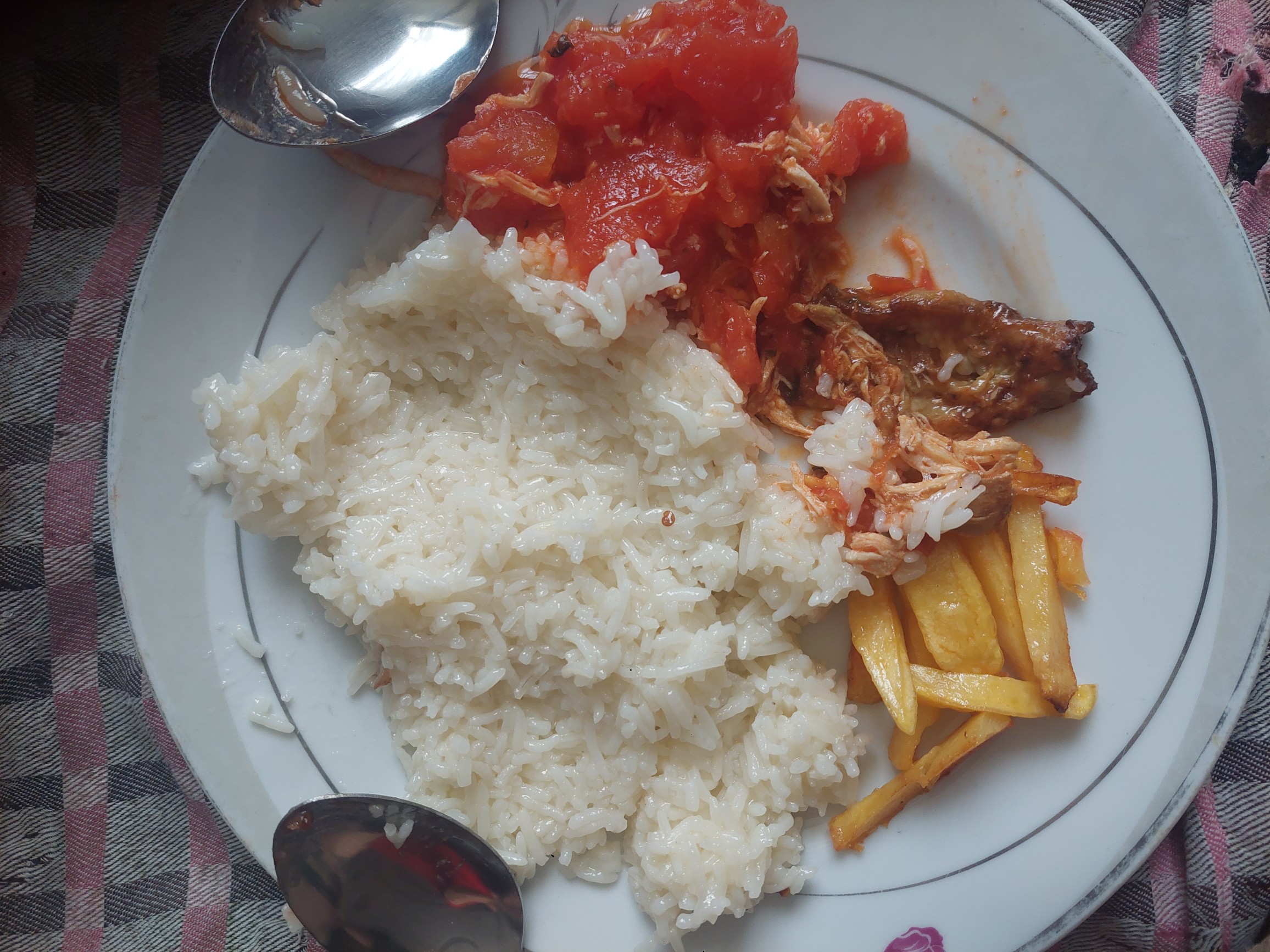 Rice with tomato sauce and fish