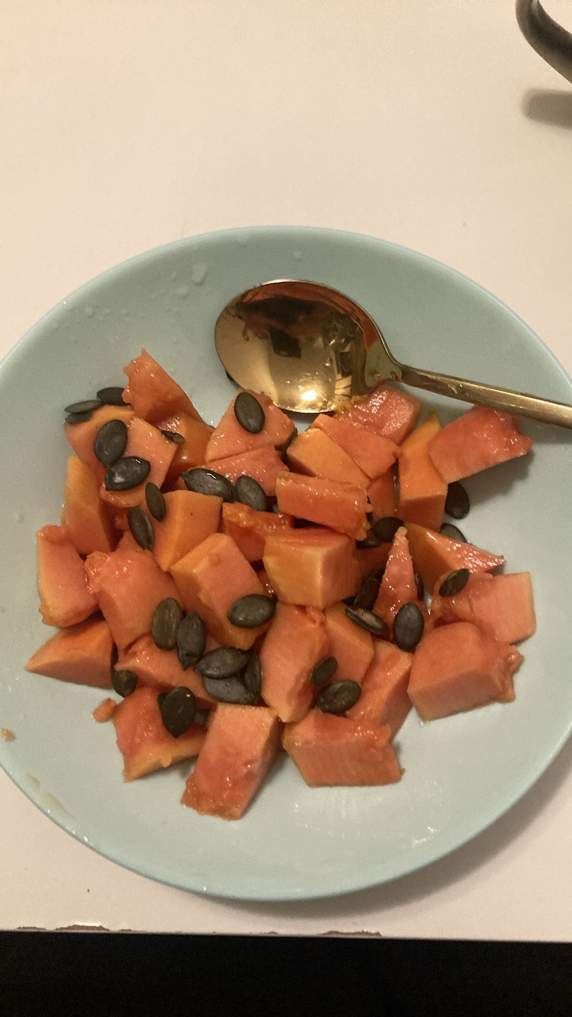 Papaya with pumpkin seeds
