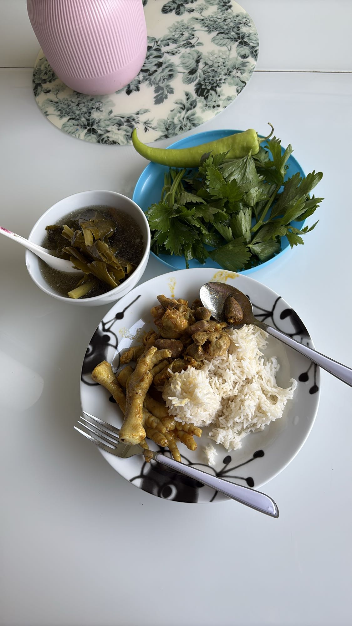 Chicken feet with rice and greens