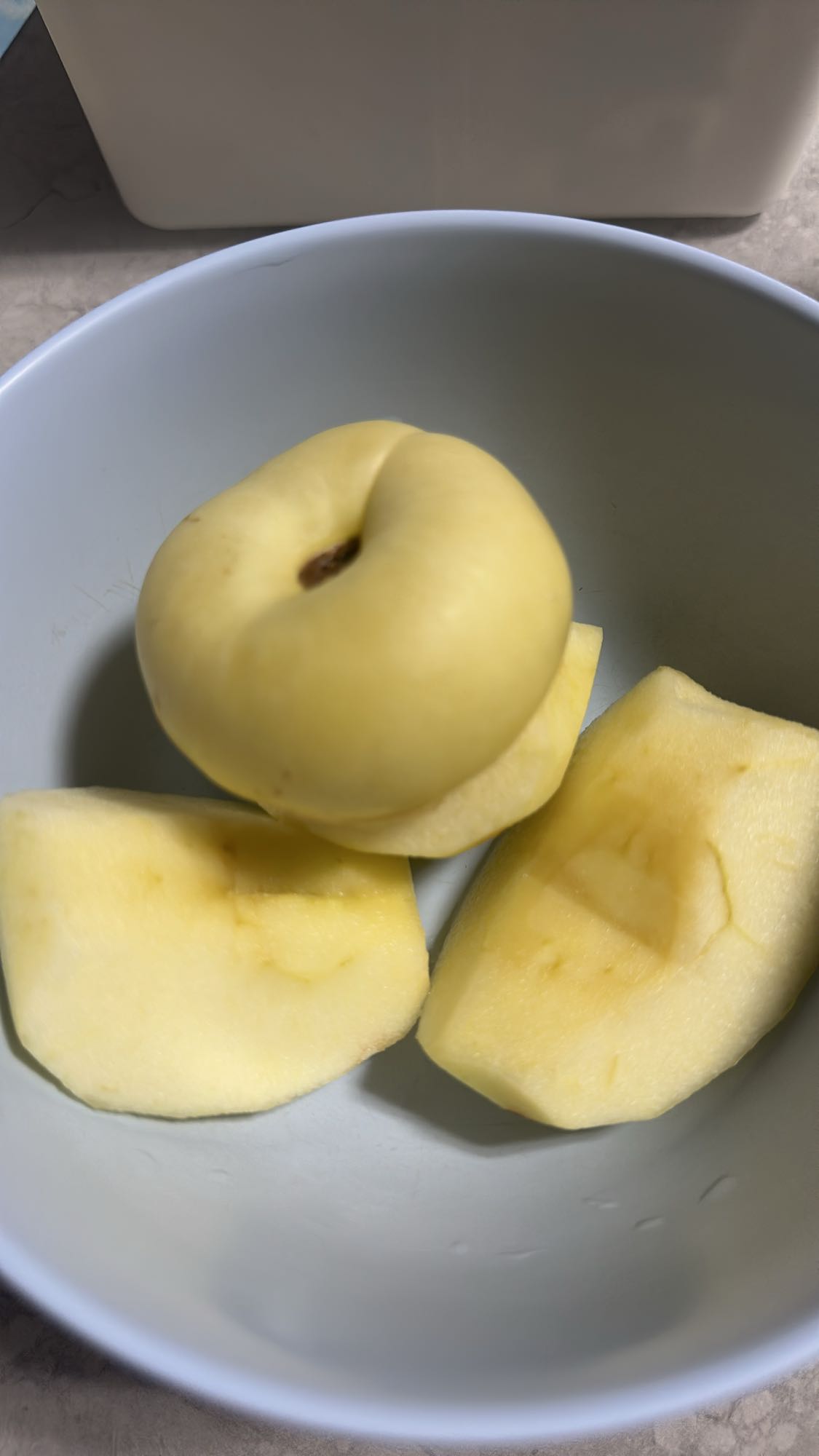 Sliced yellow apple