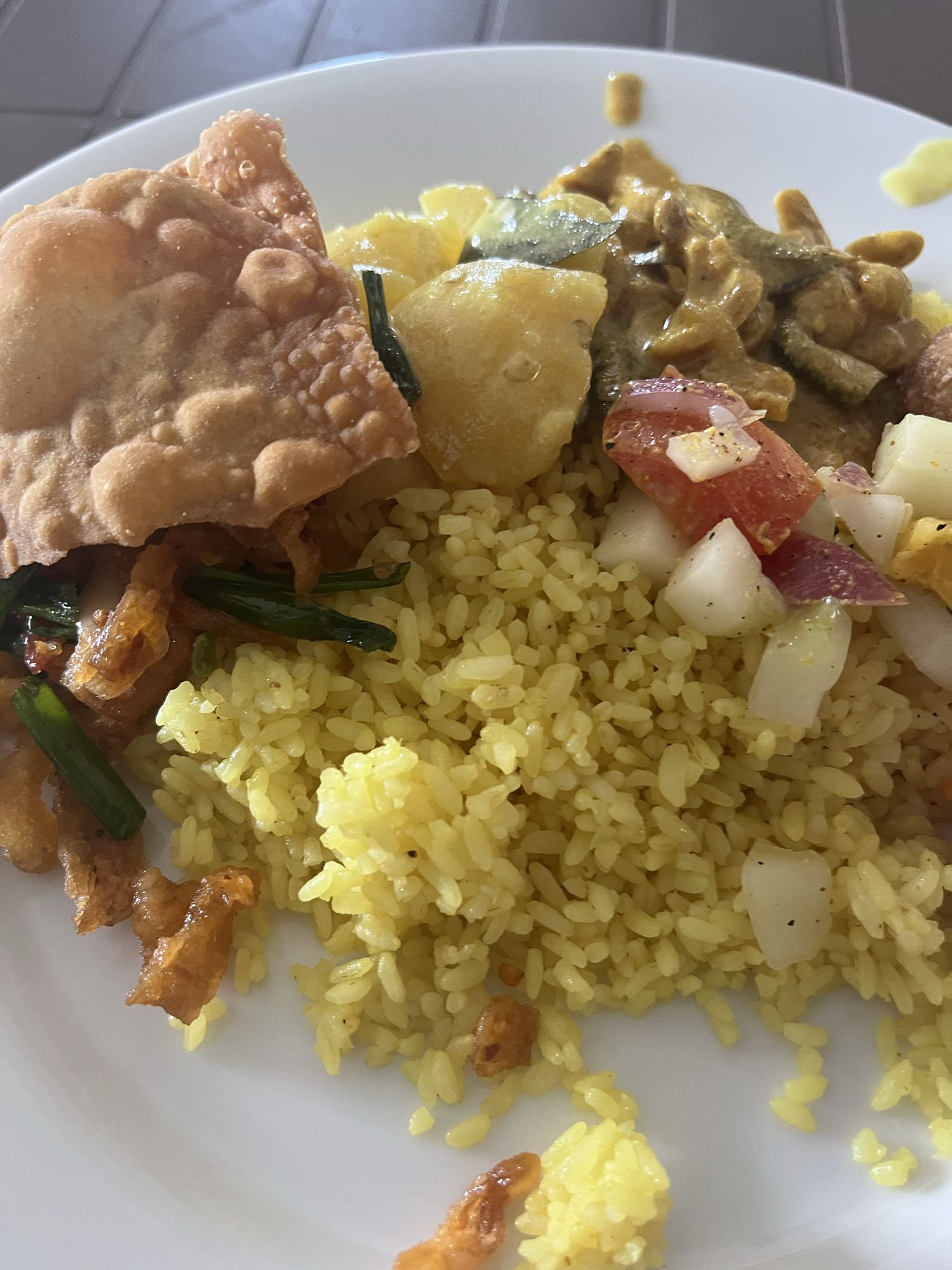Yellow rice with curry sides